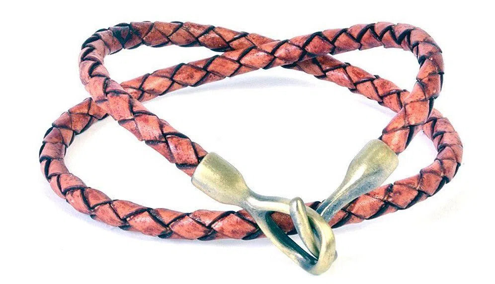 Braided leather bracelet with metal clasp displayed in Best Personalized Bracelets for Men 2021 article