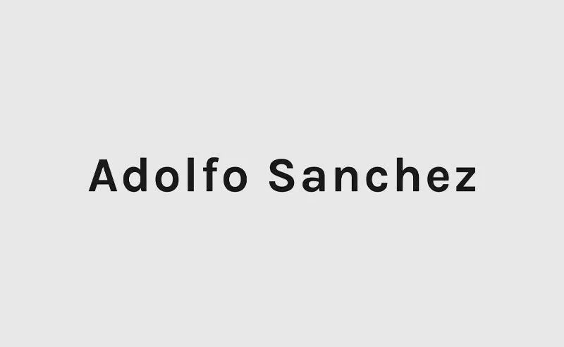 Adolfo Sanchez text displayed in an article about Designer Adolfo Sanchez wearing EKLEXIC Silver Bullet Collection Necklace