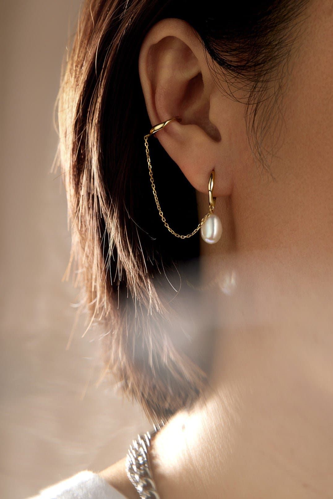 Gold chain ear cuff with pearl drop from 14K Earcuff & Pearl Drop Huggie Hoop Earrings