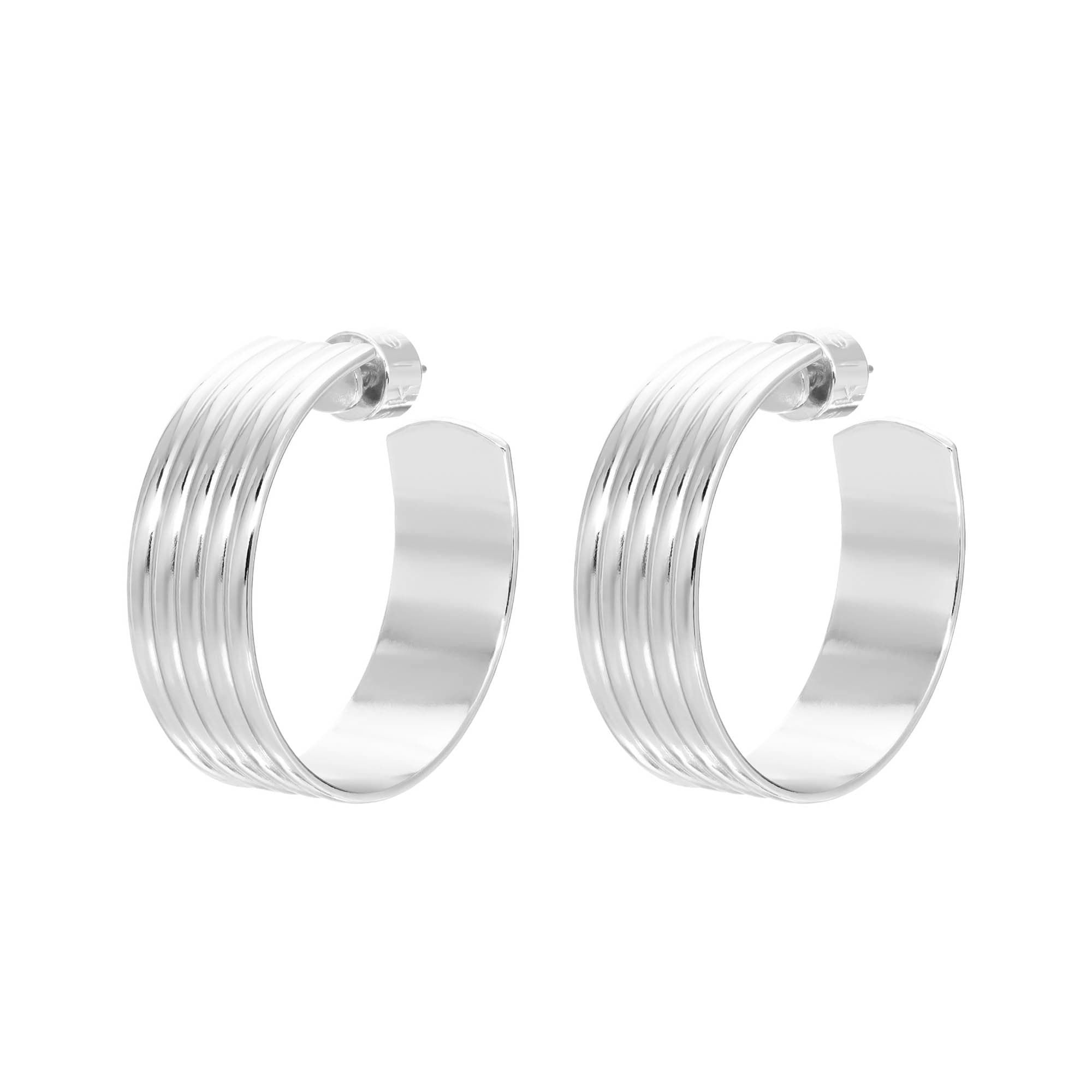 Shiny silver hoop earrings for a stylish look, called 1.25 Logan Hoops