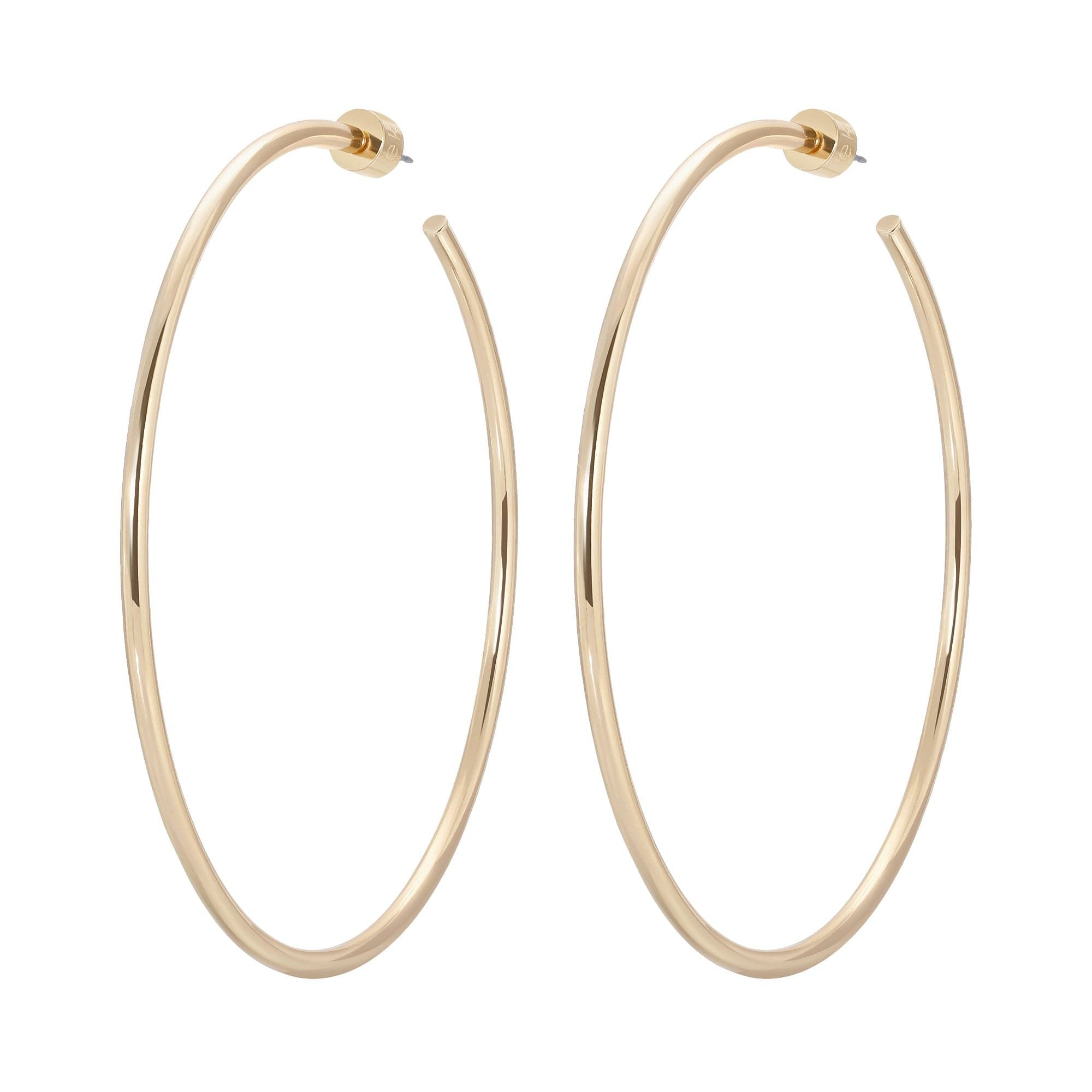 Gold hoop earrings from the 3 Inch Ultimate Hoops collection looking shiny and stylish