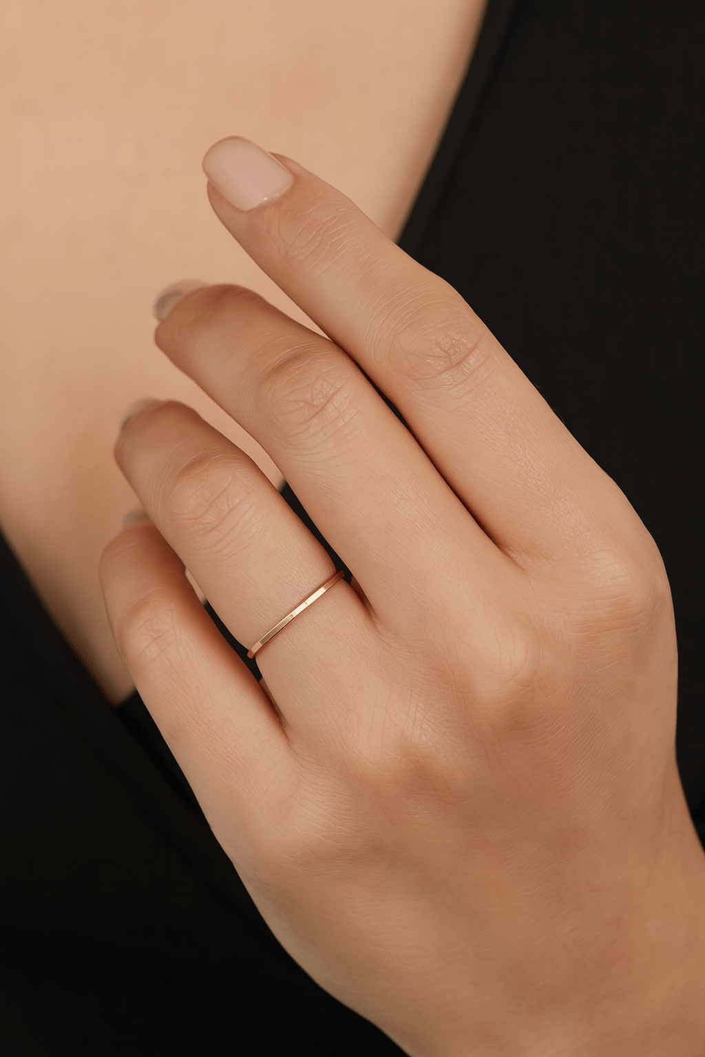 Polished 1mm Flat Gold Ring worn on finger for elegant jewelry style