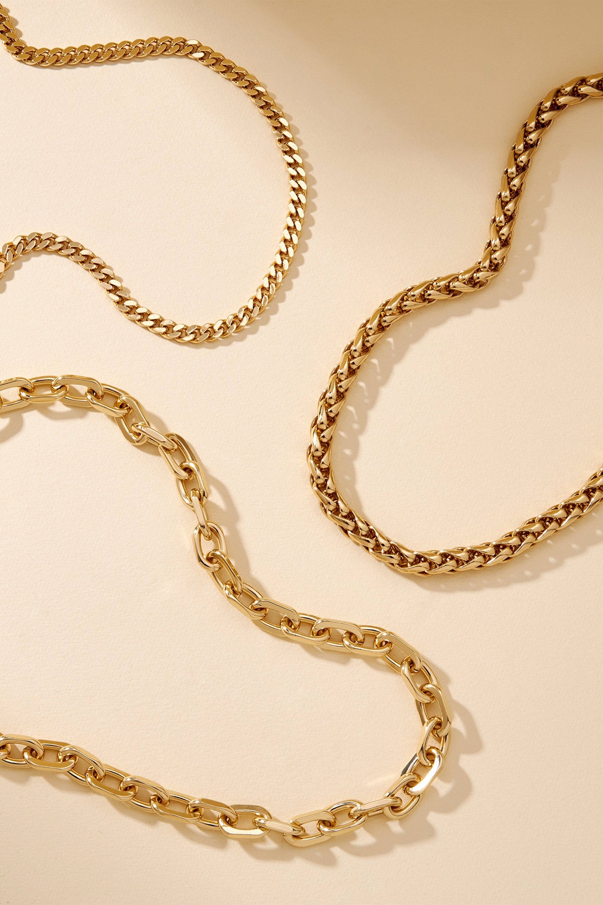 Esmé Necklace with three shiny gold-toned layered necklaces perfect for any look
