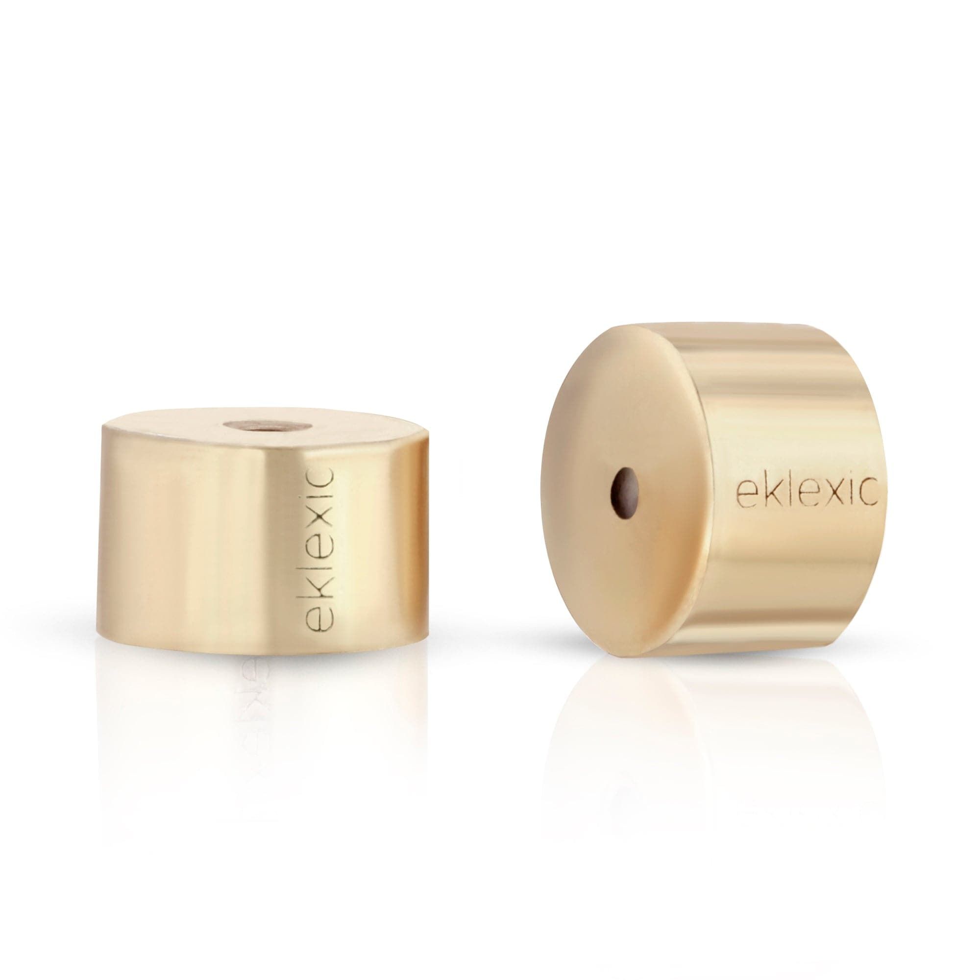 Gold-colored cylindrical Eklexic Earring Backs for secure jewelry fit