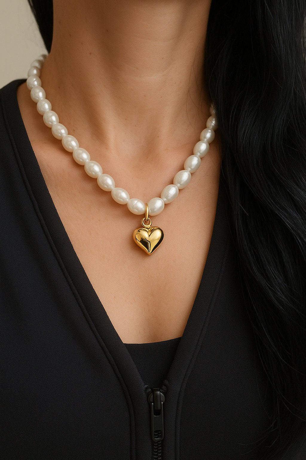 Lustrous white pearl necklace with gold heart-shaped pendant from Pearl & Puffy Heart Pendant Necklace