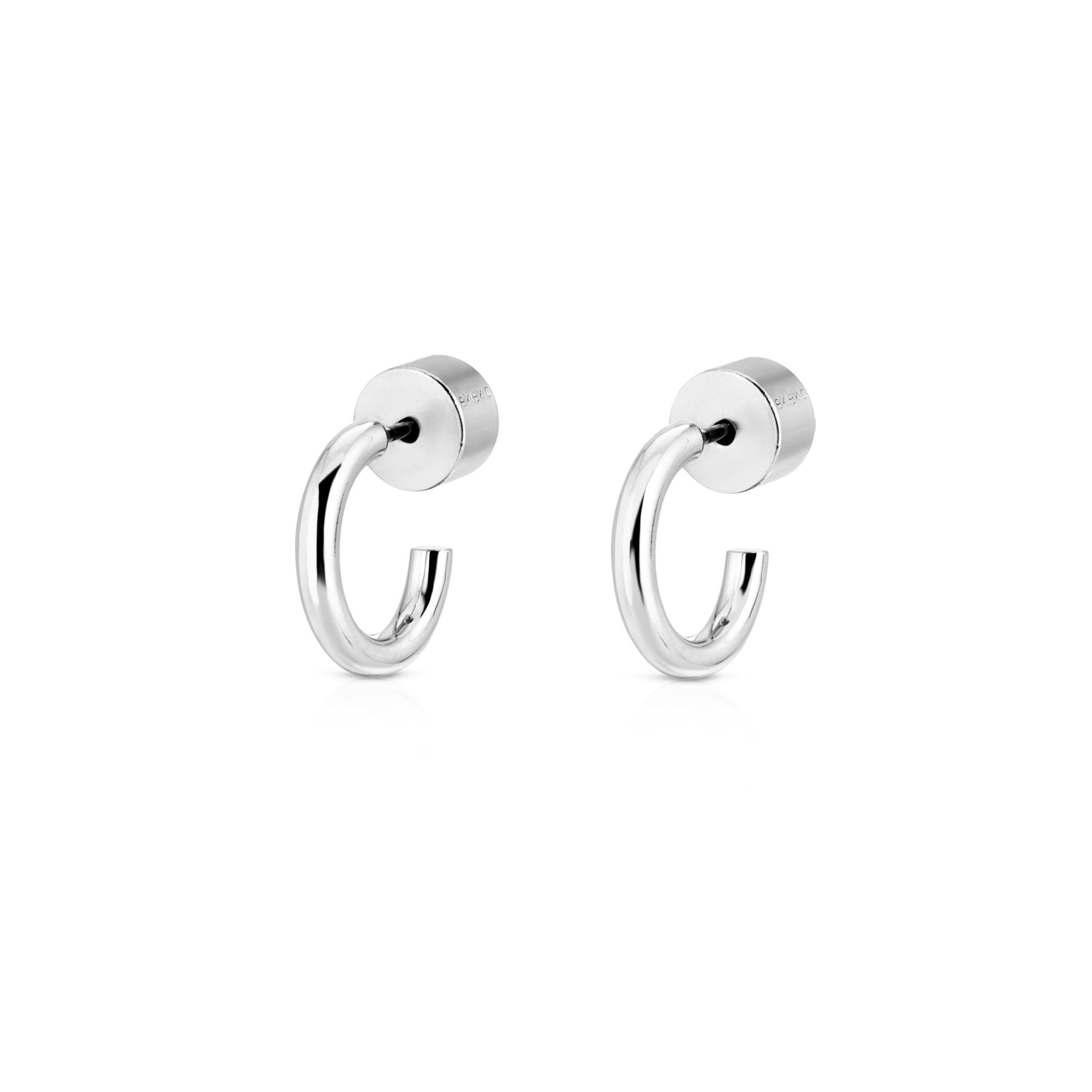 Silver hoop earrings shown in Jeanne Huggie Hoops product image