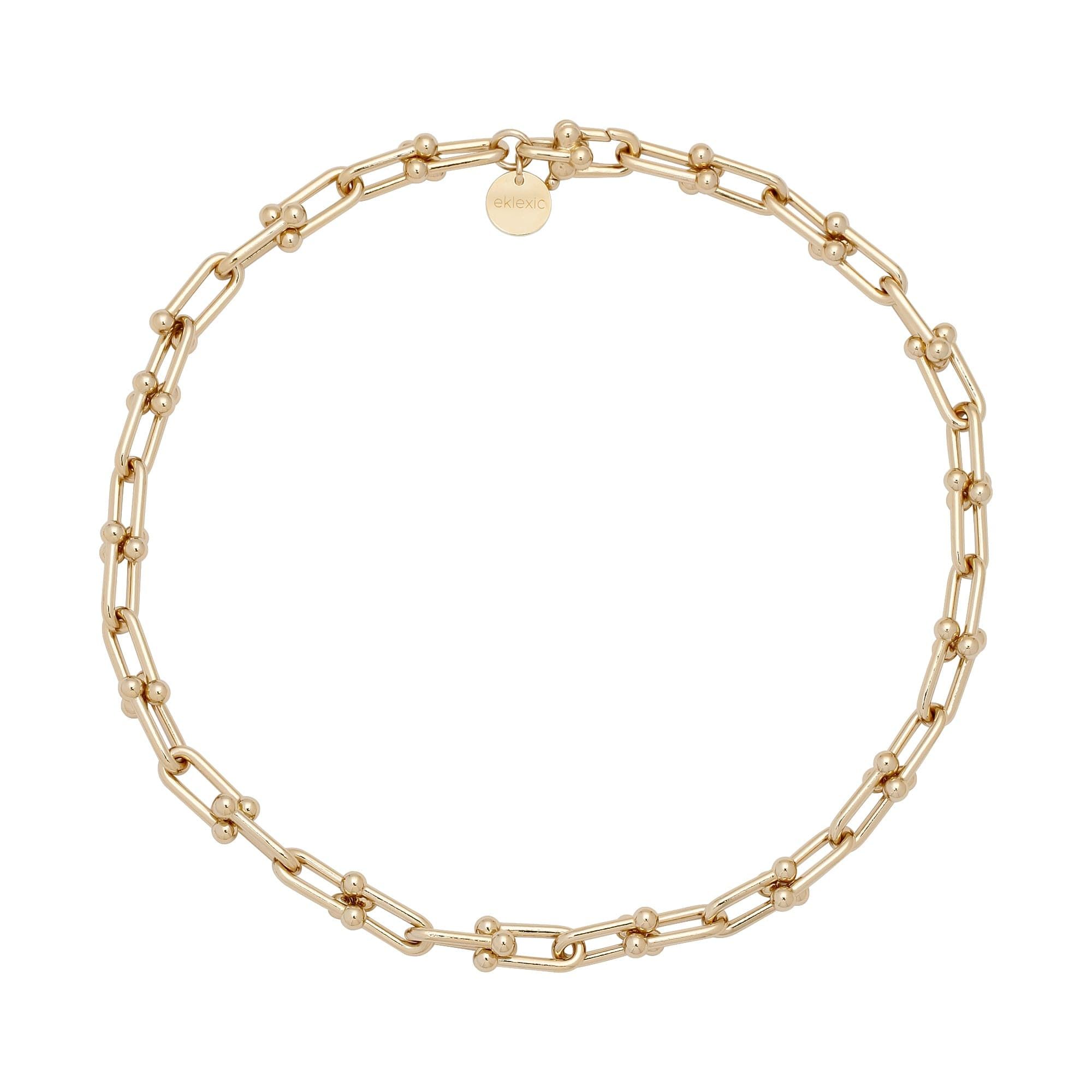 Gold chain-link necklace with circular charm from Margaux Necklace collection