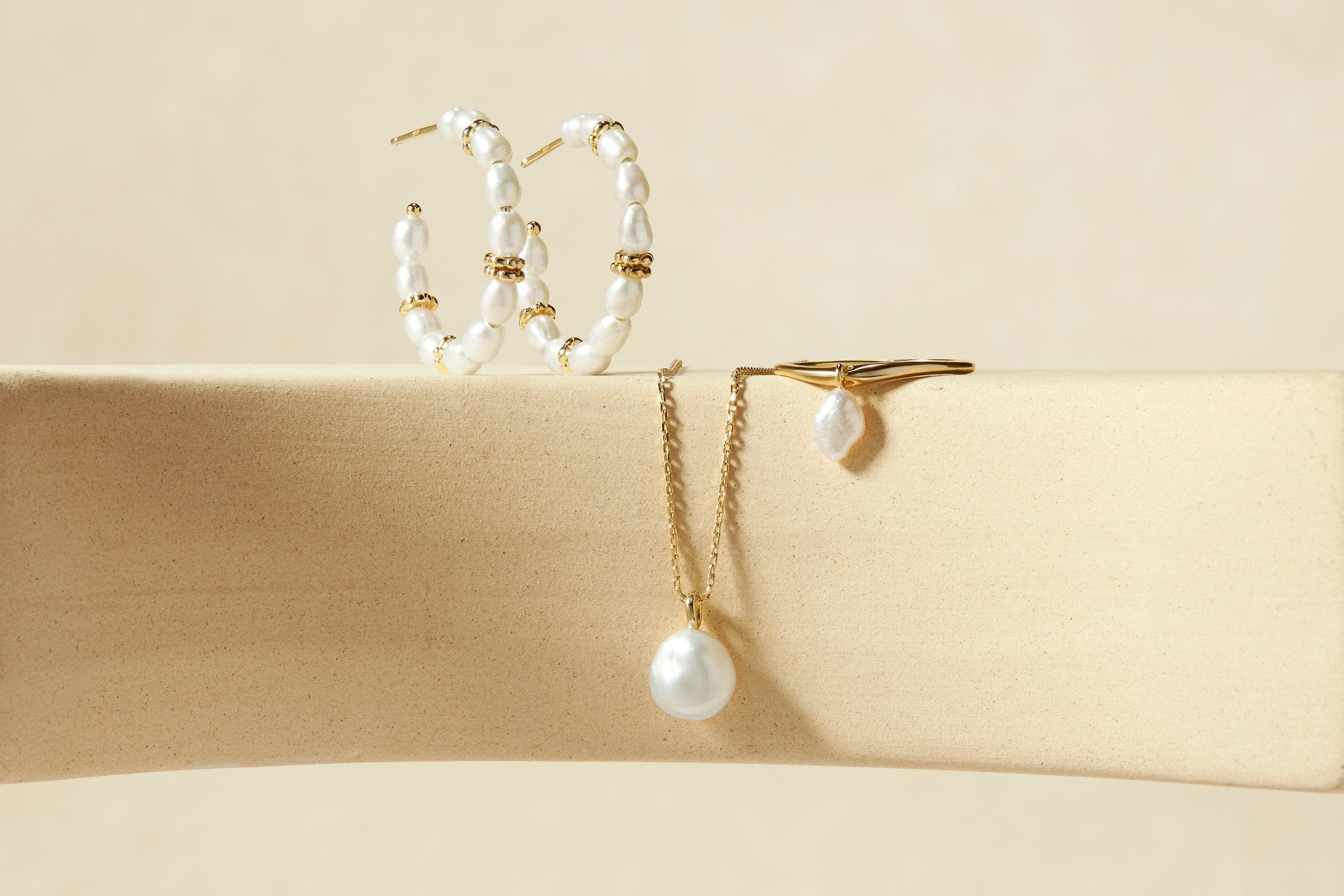 Shiny Pearl Beaded Huggie Hoops jewelry set for a classy look