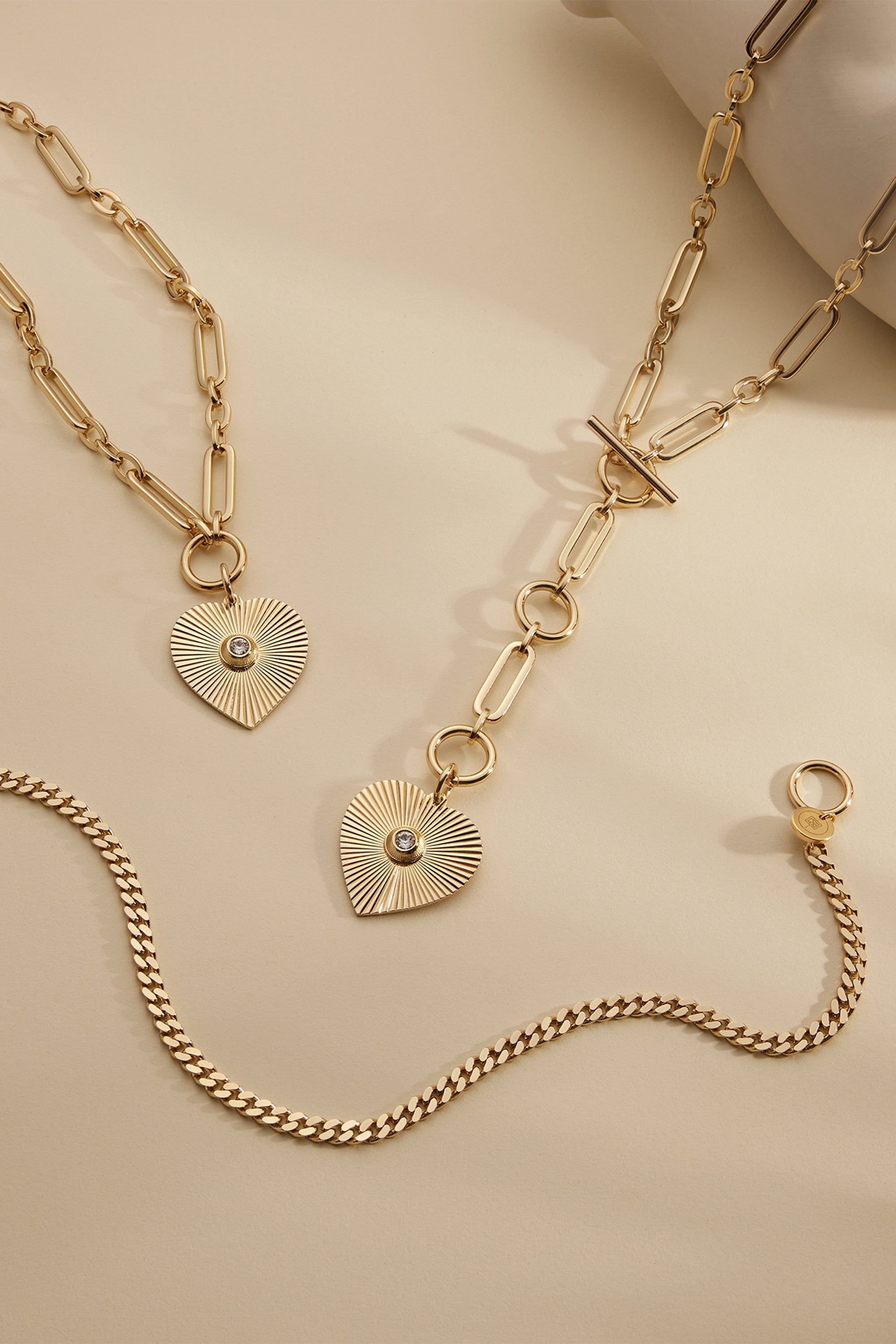 Gold-toned Perla Heart Pendant jewelry set with adorable heart pendants