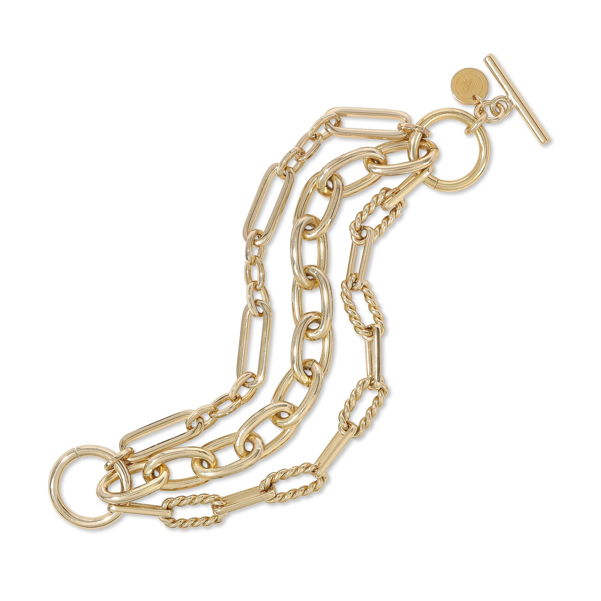 Gold-toned multi-strand chain bracelet from the Triple Multi Chain Toggle Bracelet collection