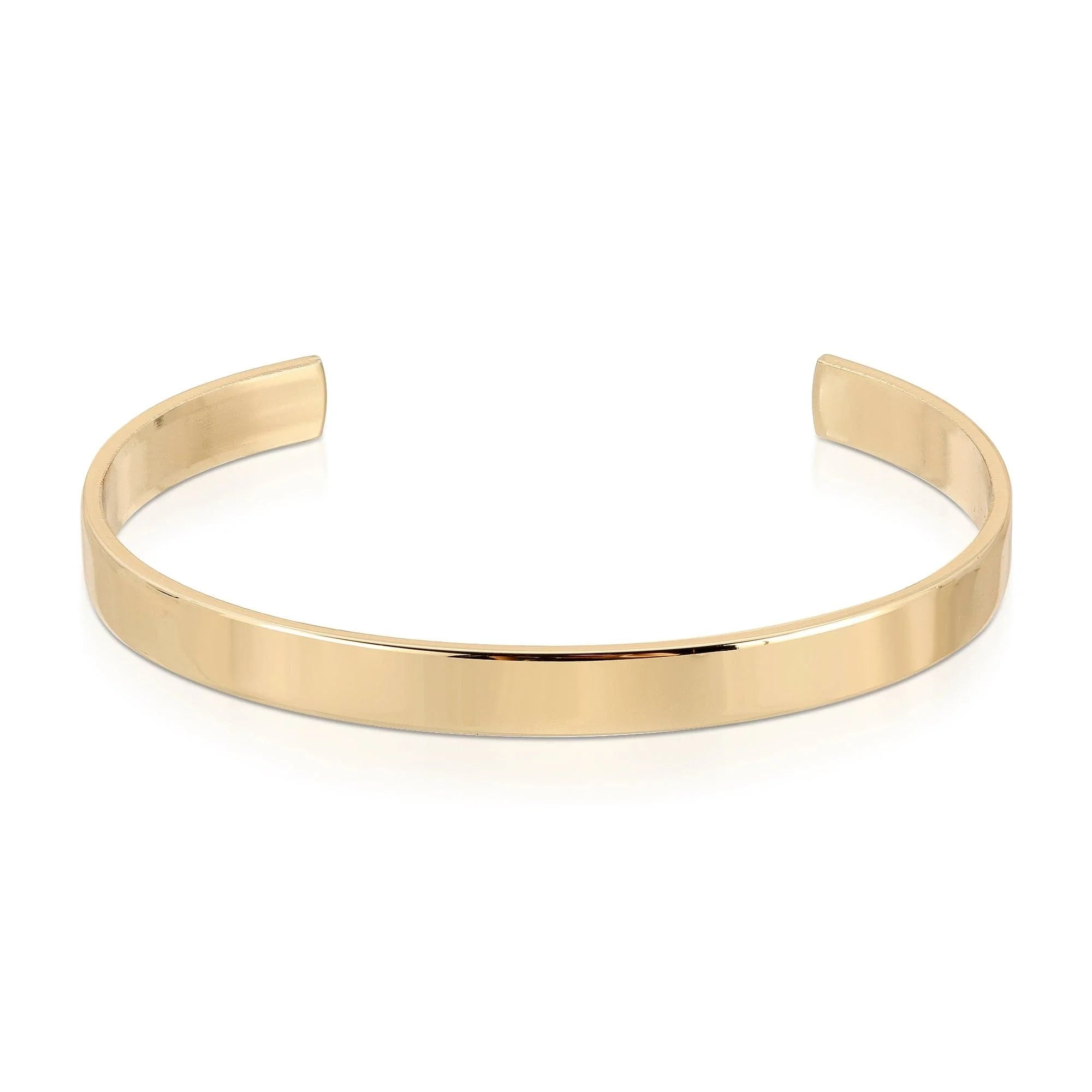 Gold-colored metal cuff bracelet on display in 1/4 Inch Brass Cuff product photo