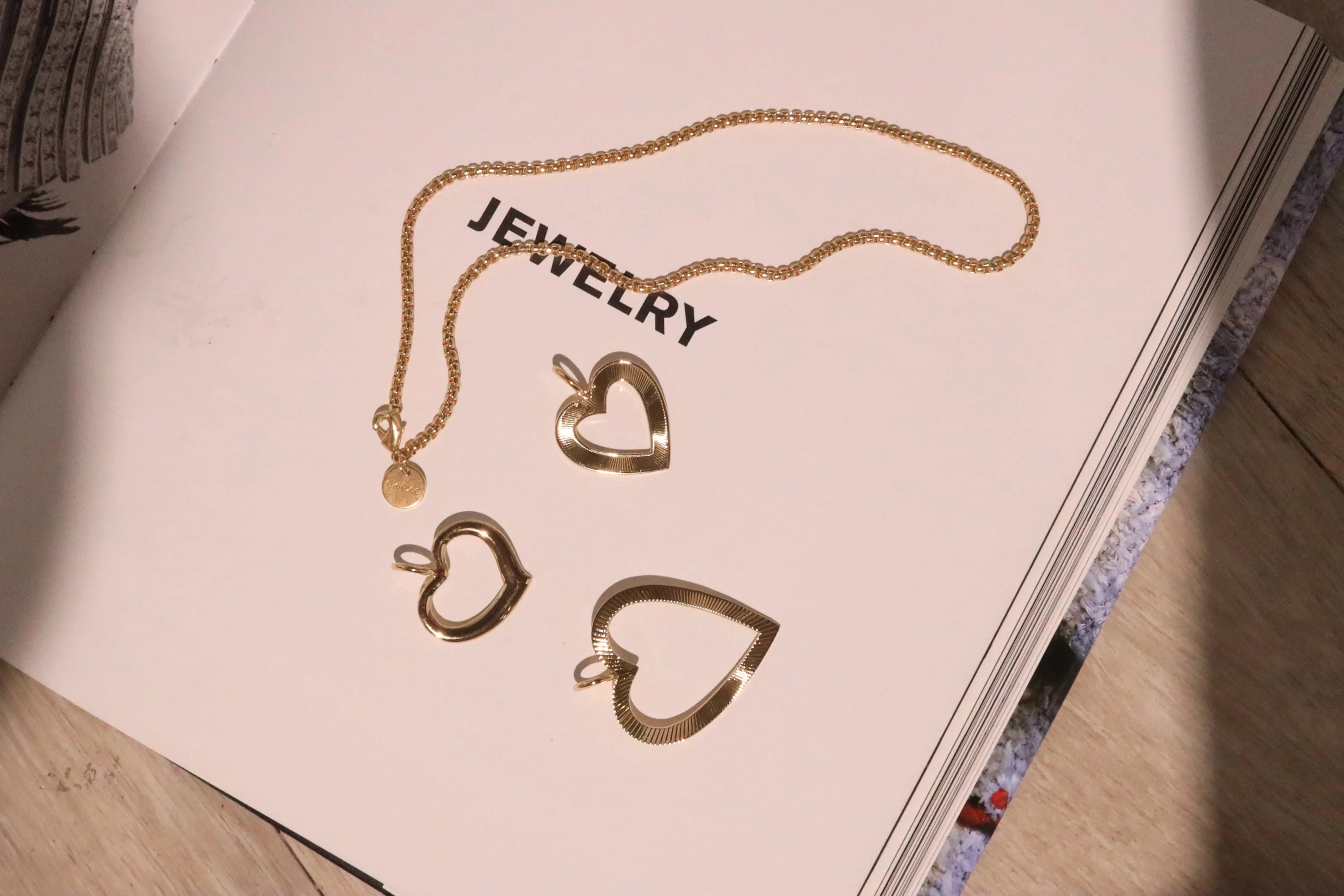 Gold chain necklace with cute open heart pendant from Haley Open Heart Pendant collection