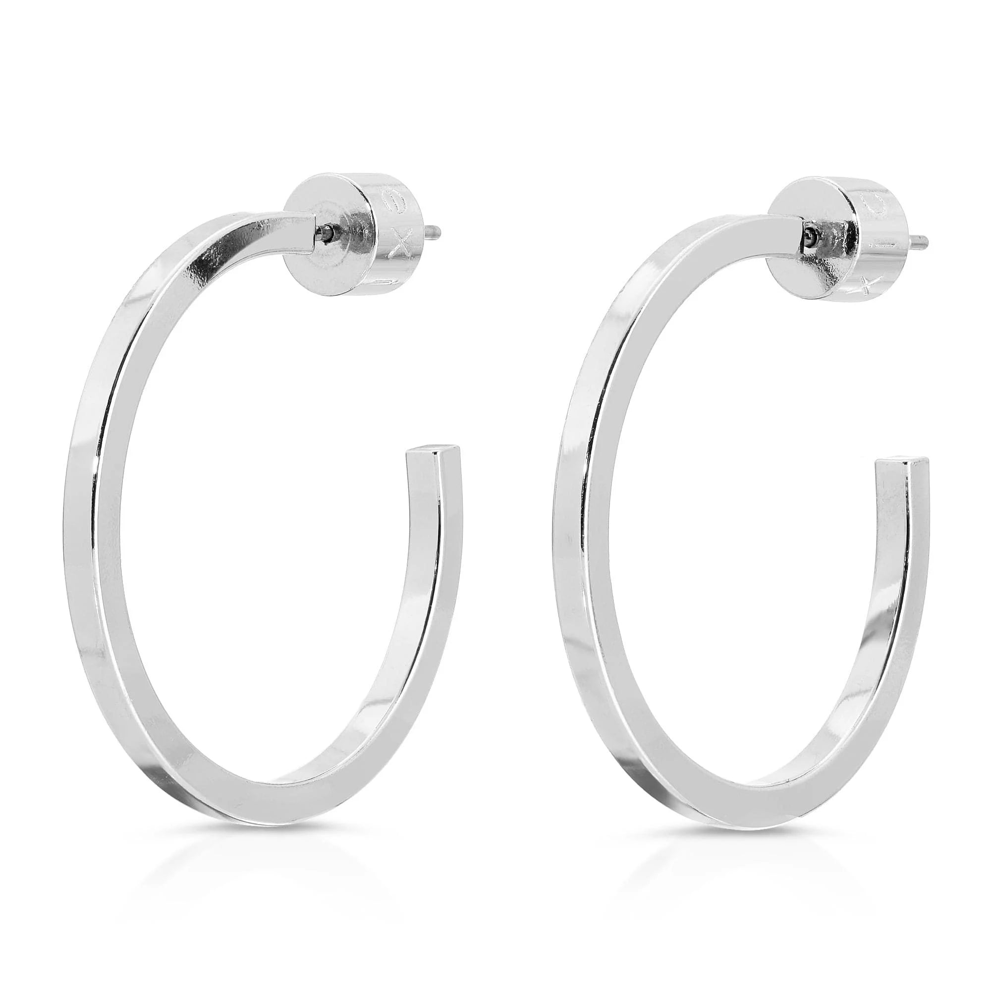 Shiny silver hoop earrings showcasing the 1 Ava Hoops jewelry piece