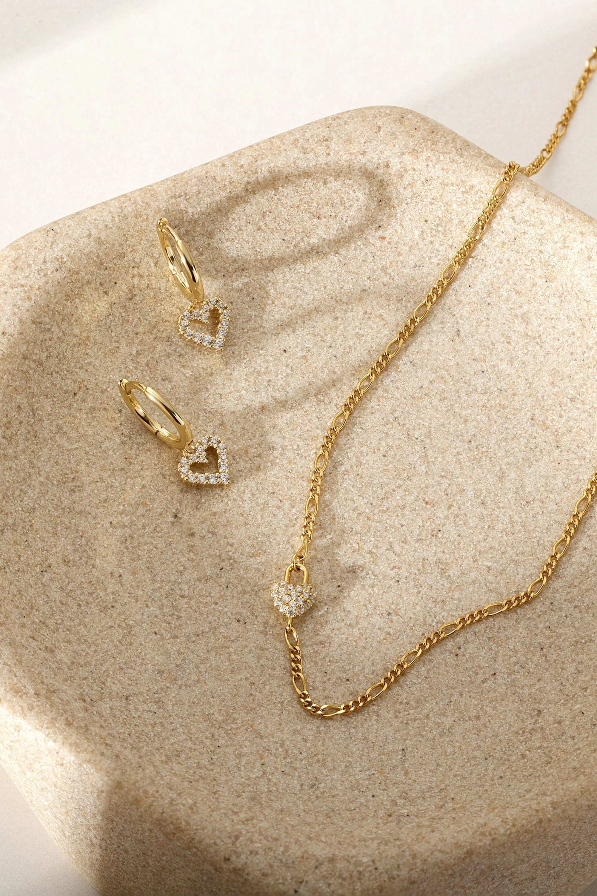 Gold heart jewelry set with Huggie Hoop and Micro CZ Heart Drop accessories