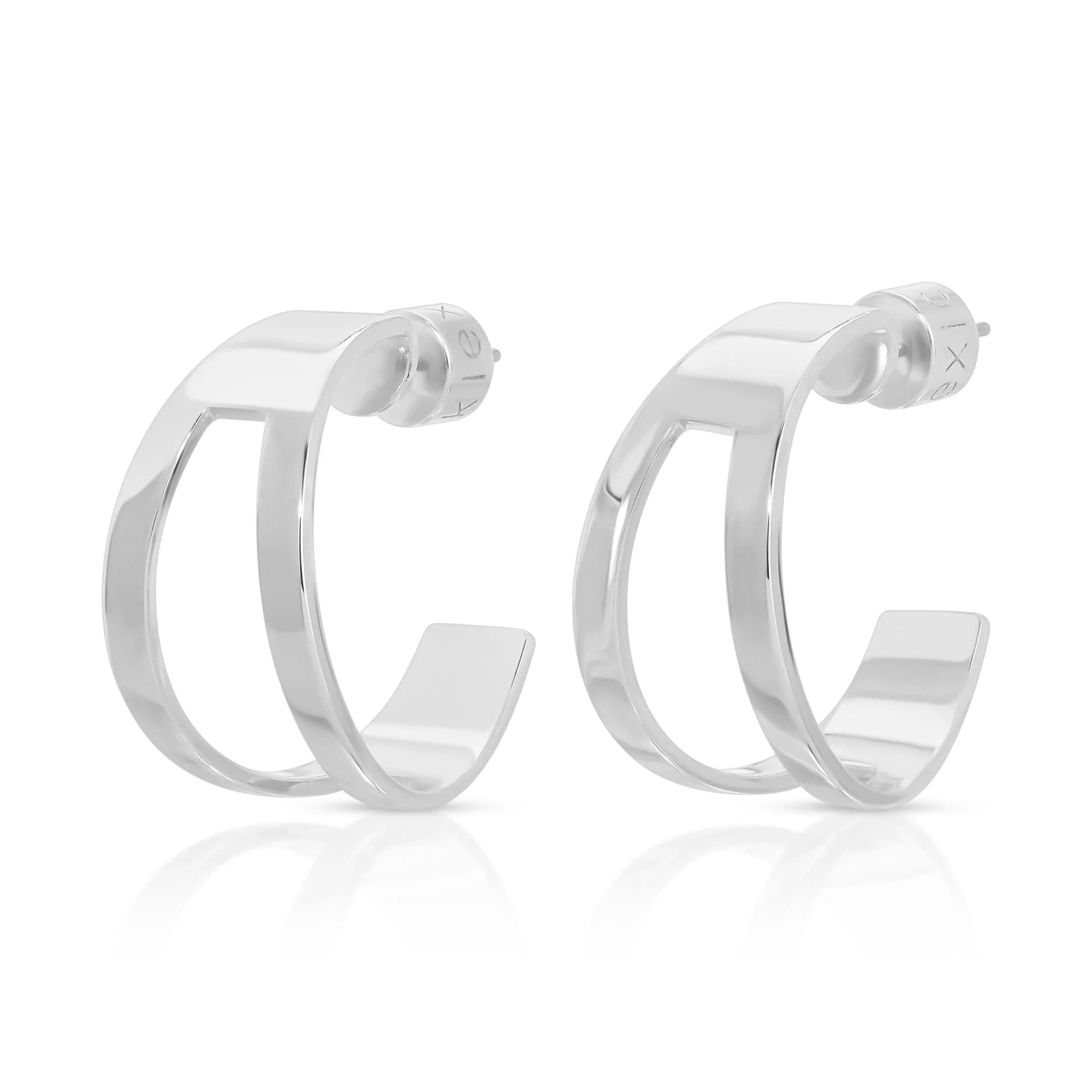 Silver hoop earrings from Theo Cut-Out Tapered Hoops line perfect for casual or dressy look