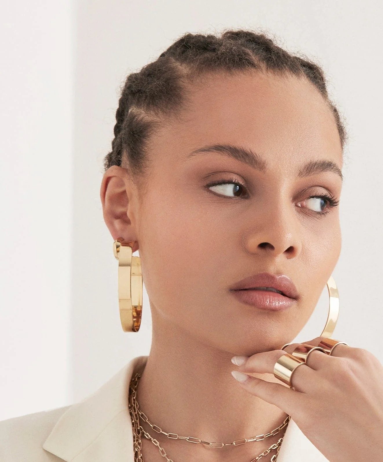 Woman wearing stylish Large Flat Hoops gold jewelry accessory