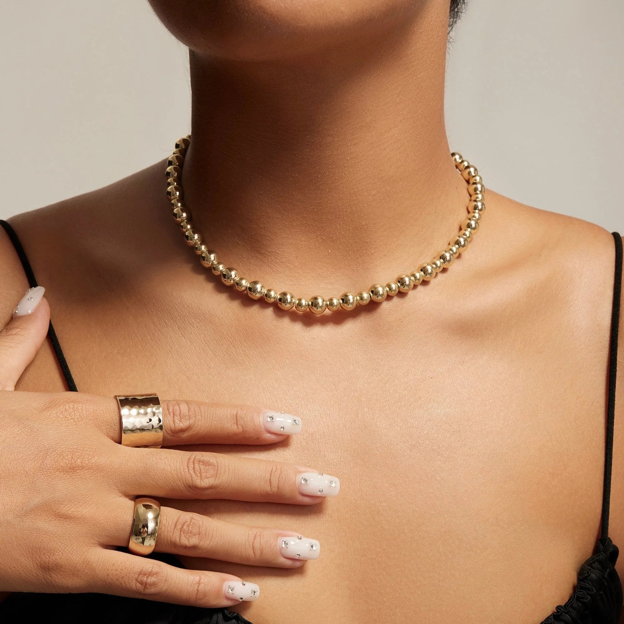 Gold beaded necklace from Beau Bead Necklace collection for trendy jewelry lovers