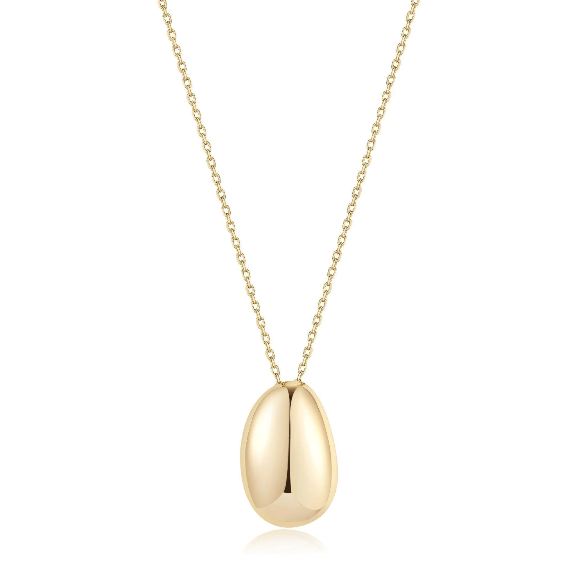 Shiny gold teardrop-shaped pendant on a delicate chain from Harmony Pebble Pendant Necklace