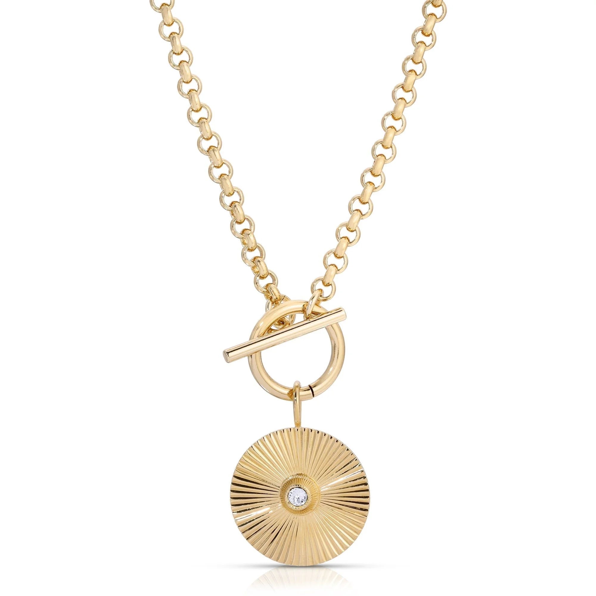 Gold chain necklace featuring a sunburst pendant from Micro Royal Toggle & Ocean Pendant Necklace
