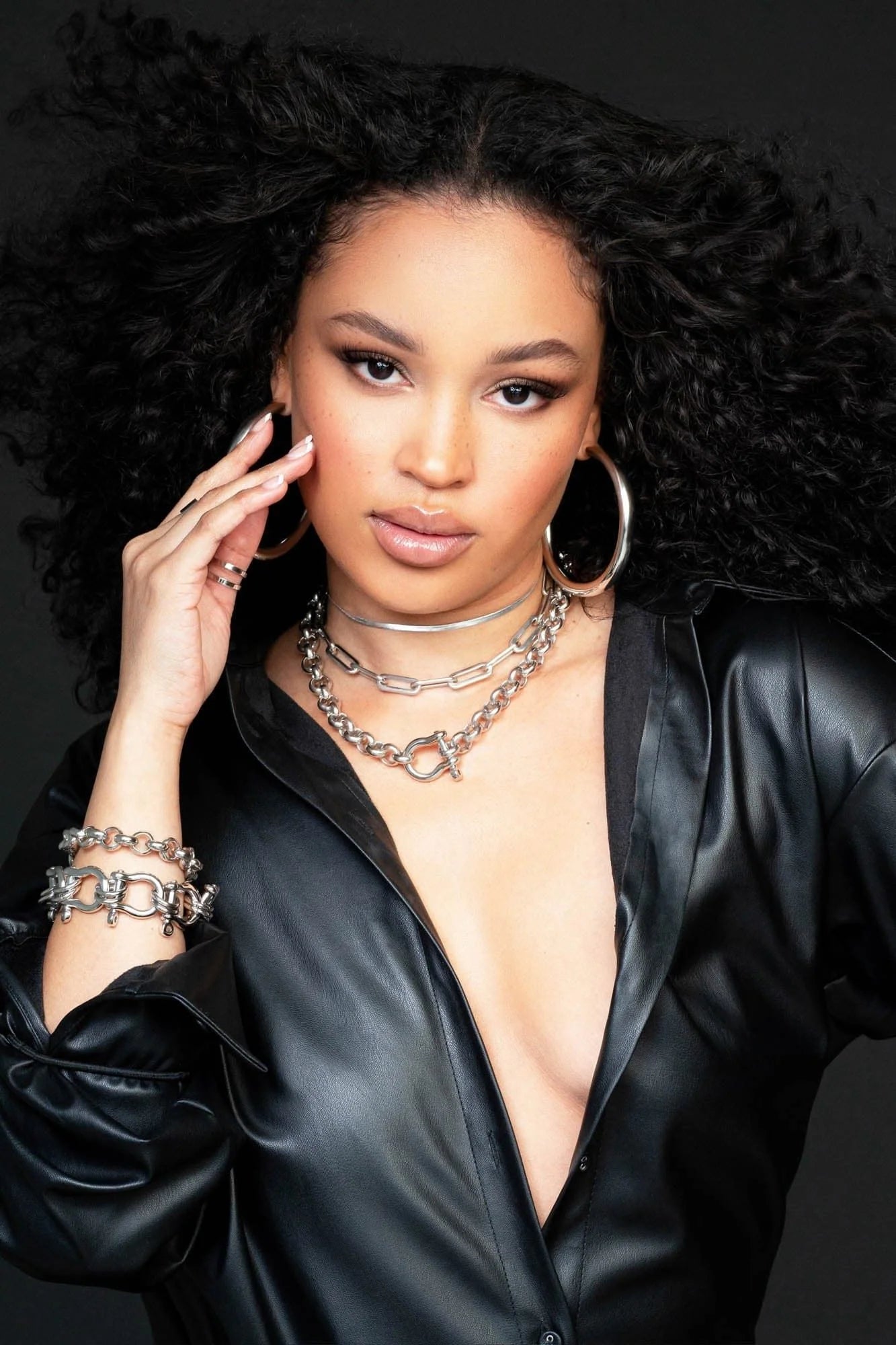 Woman in a black leather shirt wearing silver Royal Necklace jewelry look