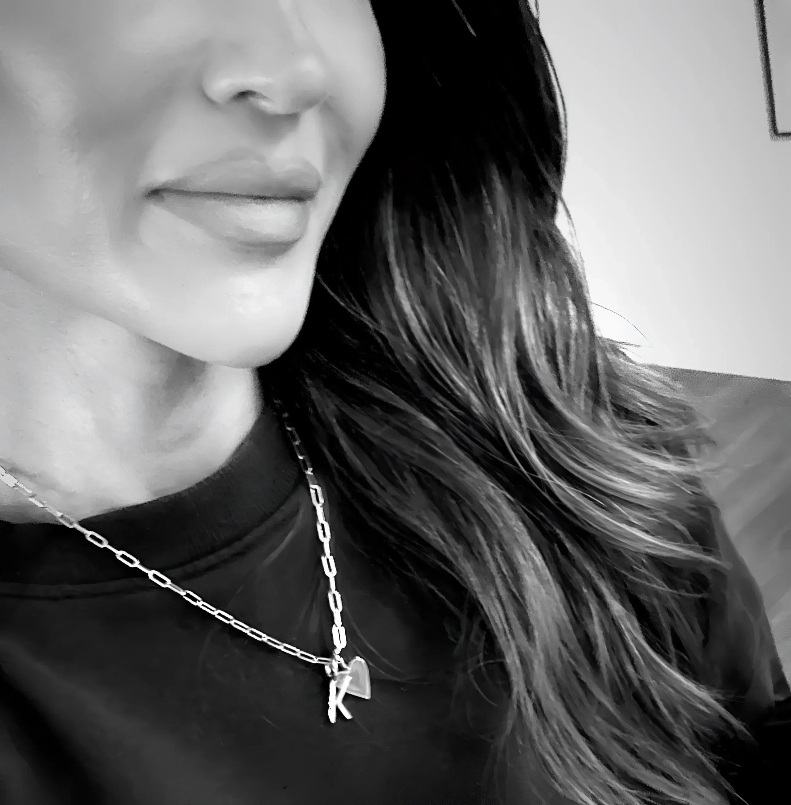 Silver initial necklace with a sleek charm for personalized style