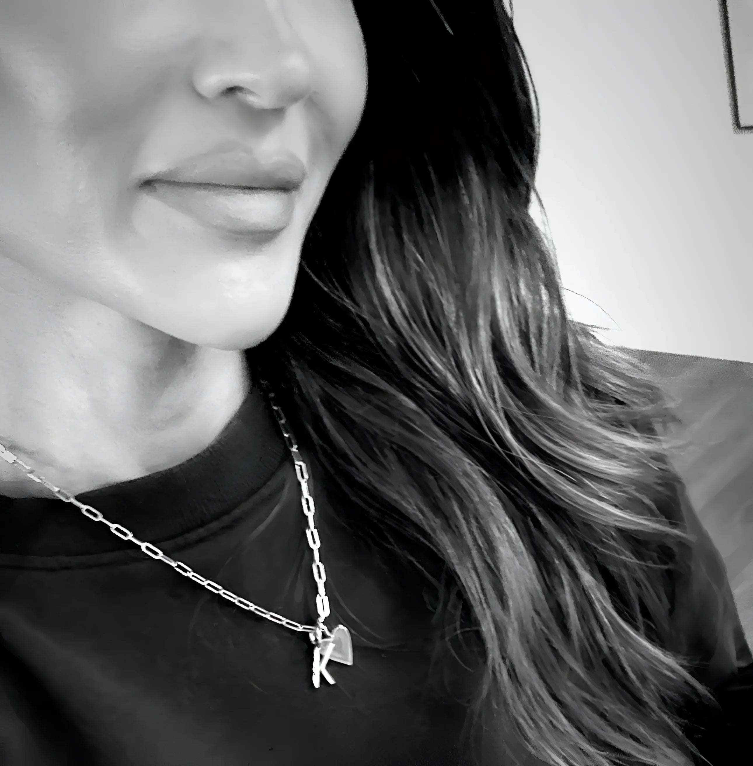 Silver initial necklace with a sleek charm for personalized style