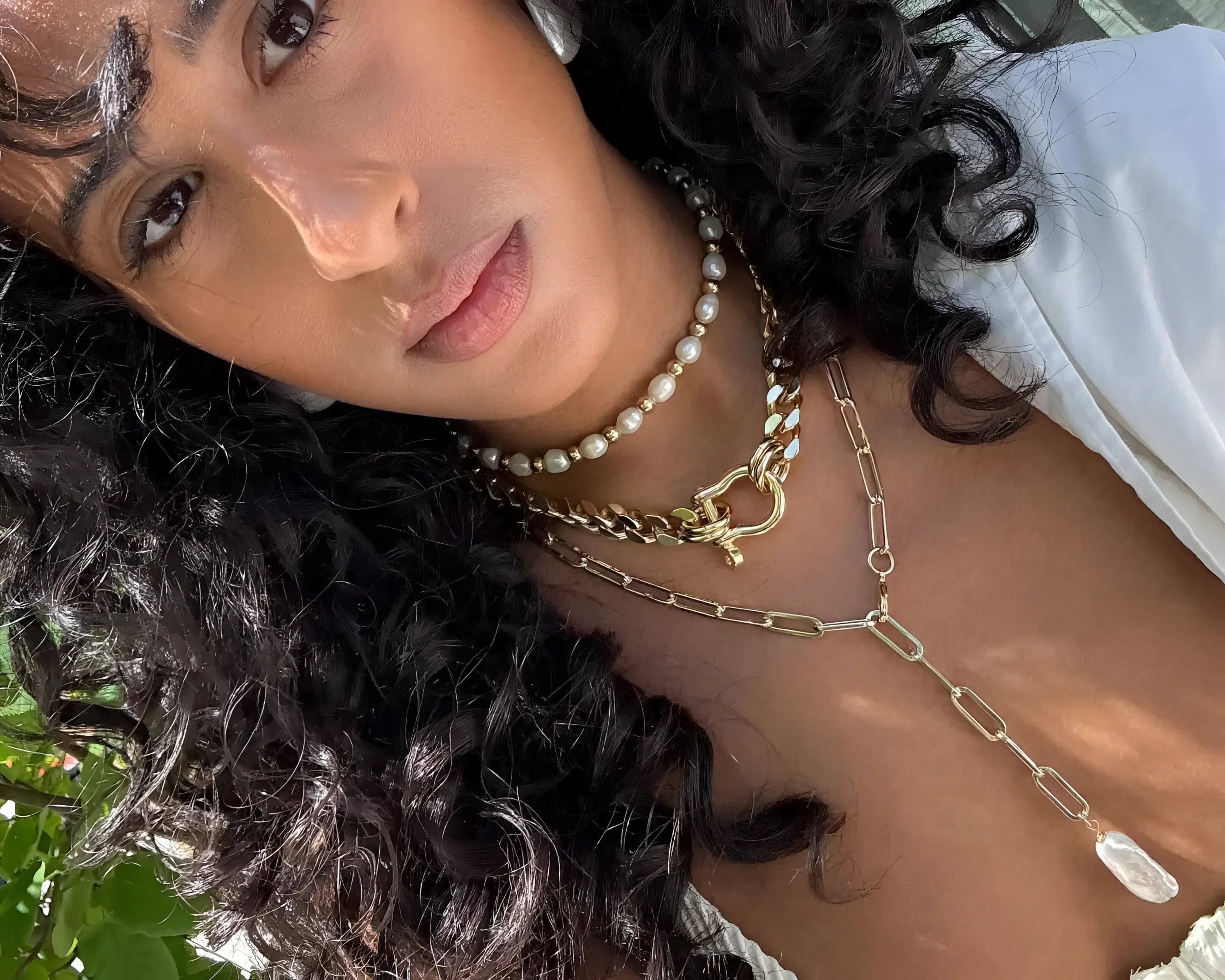 Layered gold and pearl necklaces from the Tayla Necklace collection