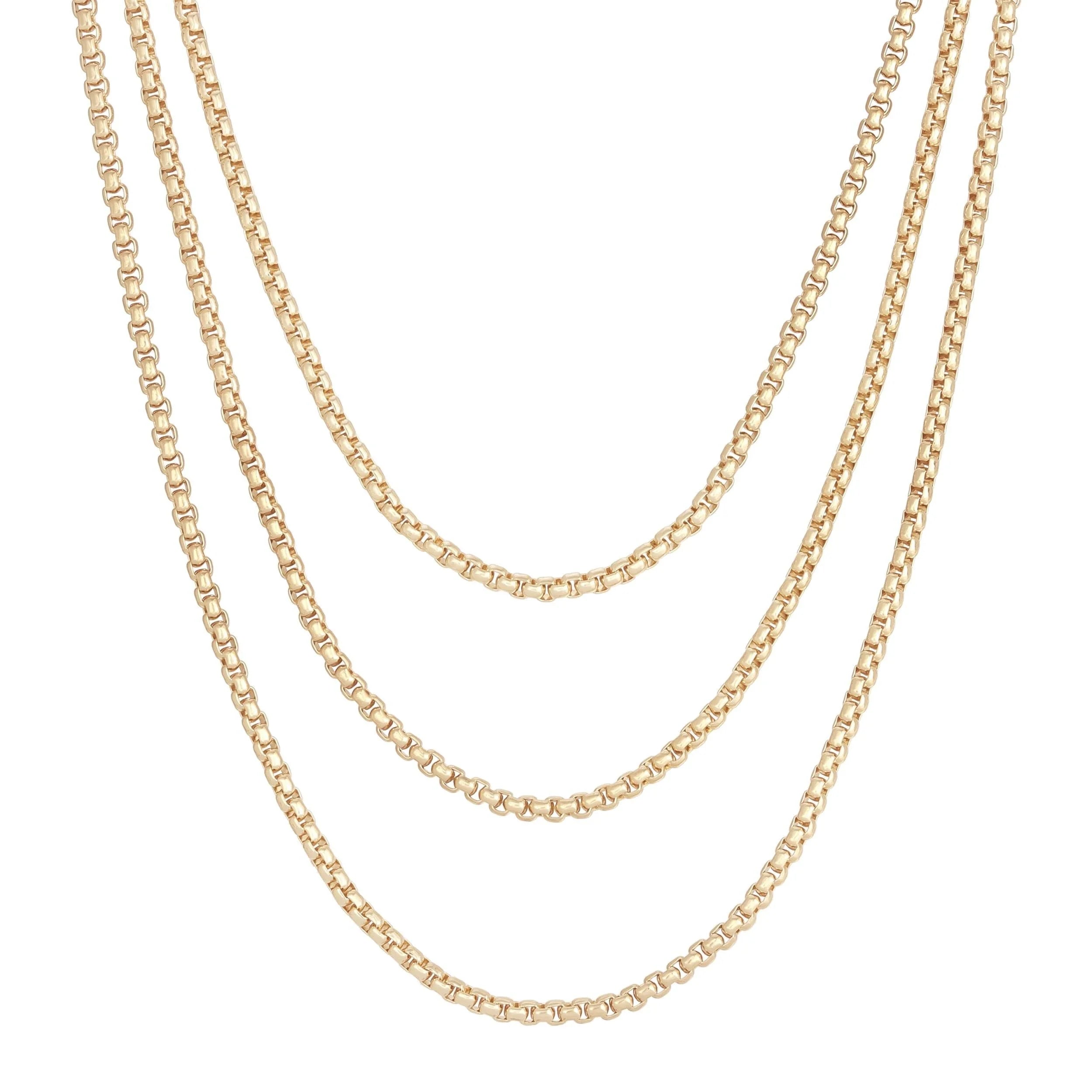 Three gold box chain necklaces on a display for the Triple Layer Thin Luciana Box Chain Necklace