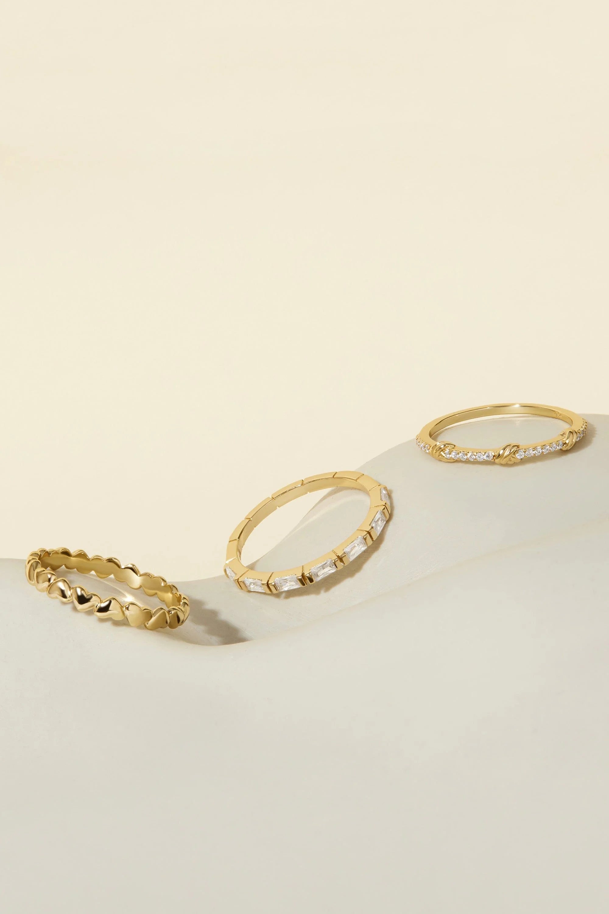 Gold-toned Sweetheart Ring with heart shapes baguette-cut and pave-set clear stones