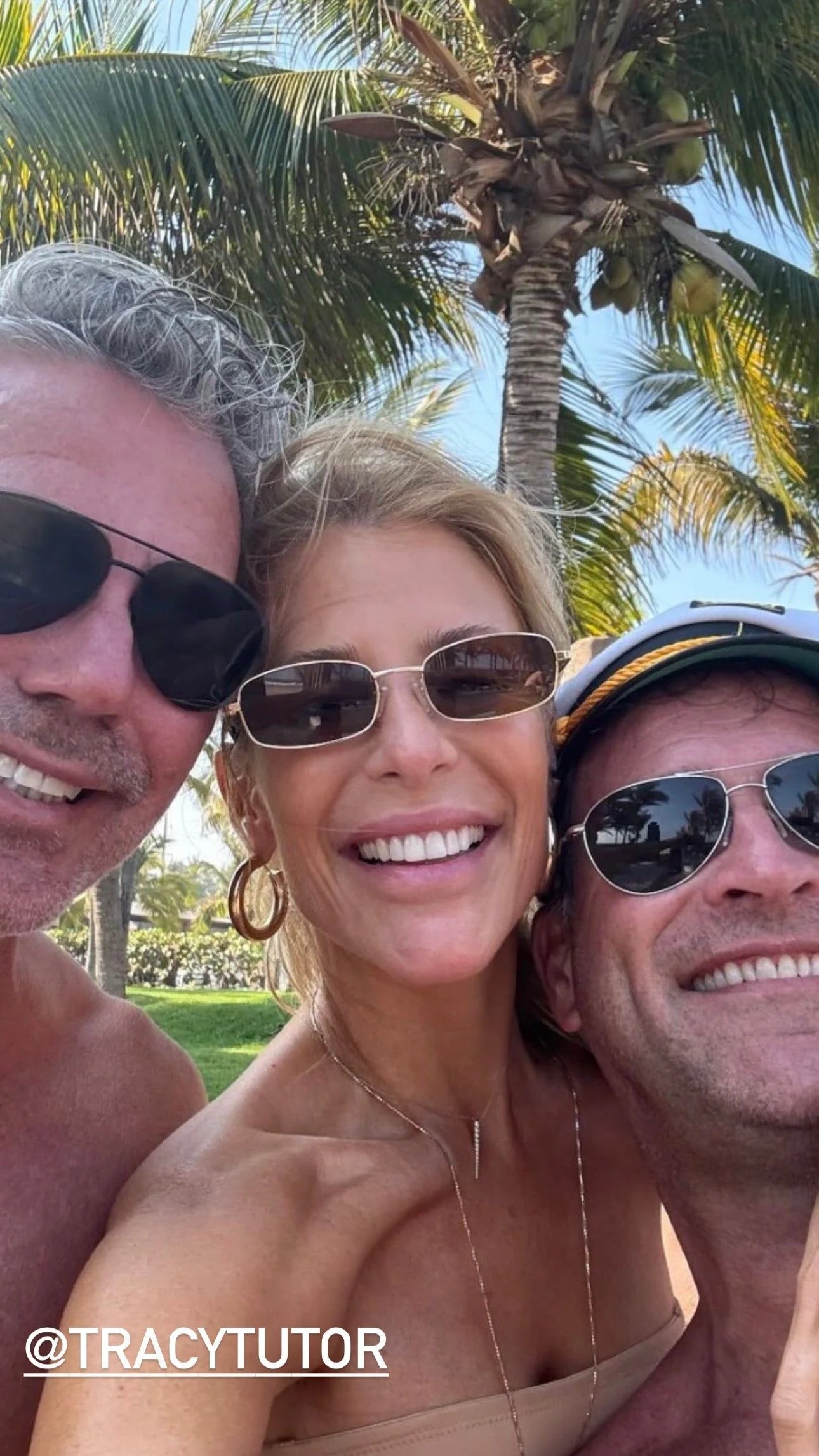 Smiling group selfie featuring Zolen Hoops jewelry in the foreground