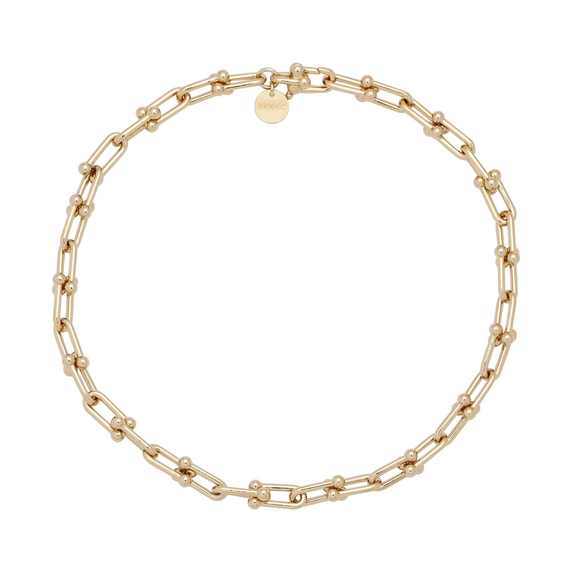 Margaux Necklace featuring 14k gold chain-link with custom u link and circular charm