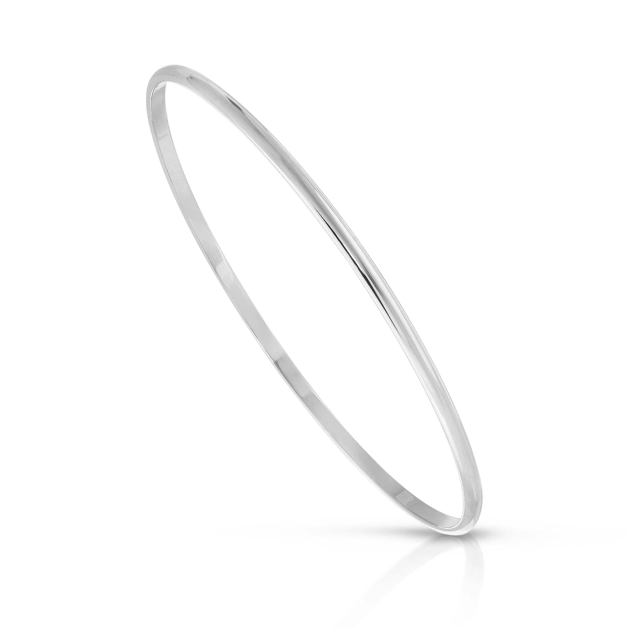 Silver bangle bracelet from Skinny Lucy Recycled collection featuring lucy recycled brass design