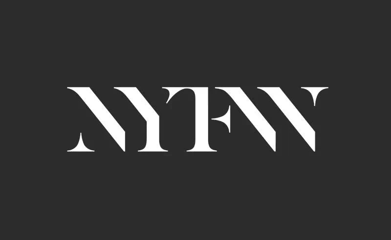 Stylized NYFW lettering at a New York Fashion Week event featuring Carmen Electra