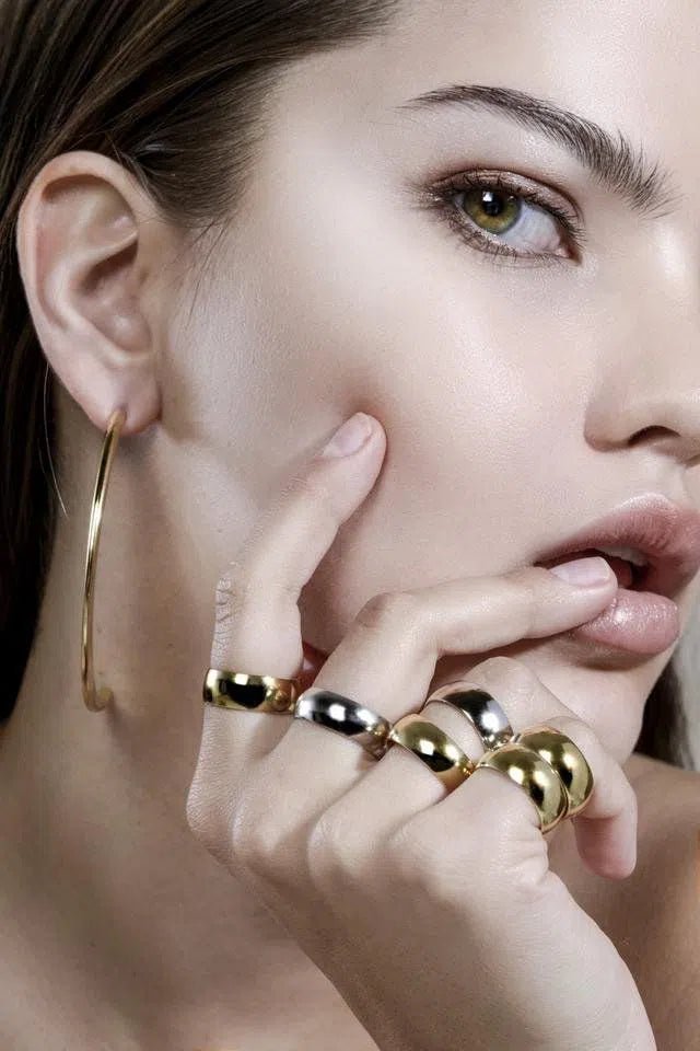 Woman’s face with gold jewelry featured in Eklexic on OKMagazine.com Nov 21 2014