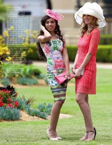 Two women in dresses and hats, showcasing Eklexic featured in FINE MAGAZINE July 2015.