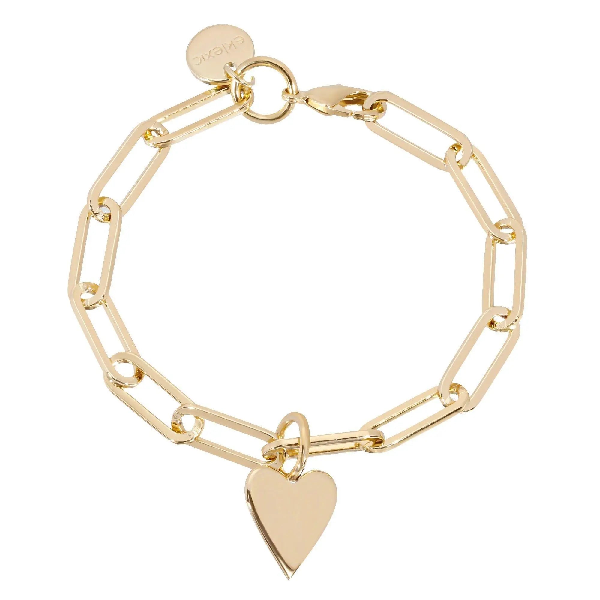 Gold-toned link bracelet with heart charm from the Charm Bracelets collection.