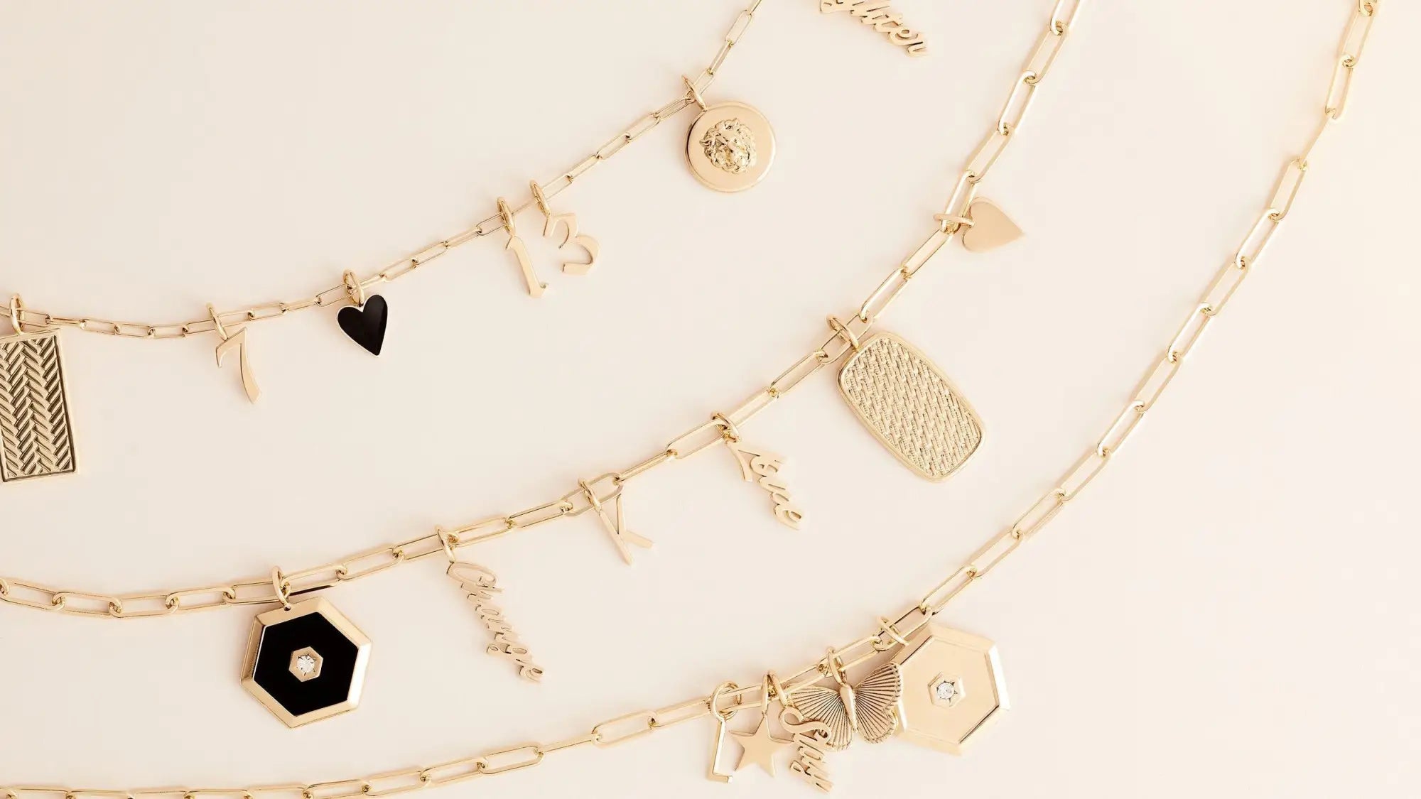 Gold charm necklaces from the CHARMS, LOCKETS & PENDANTS collection.