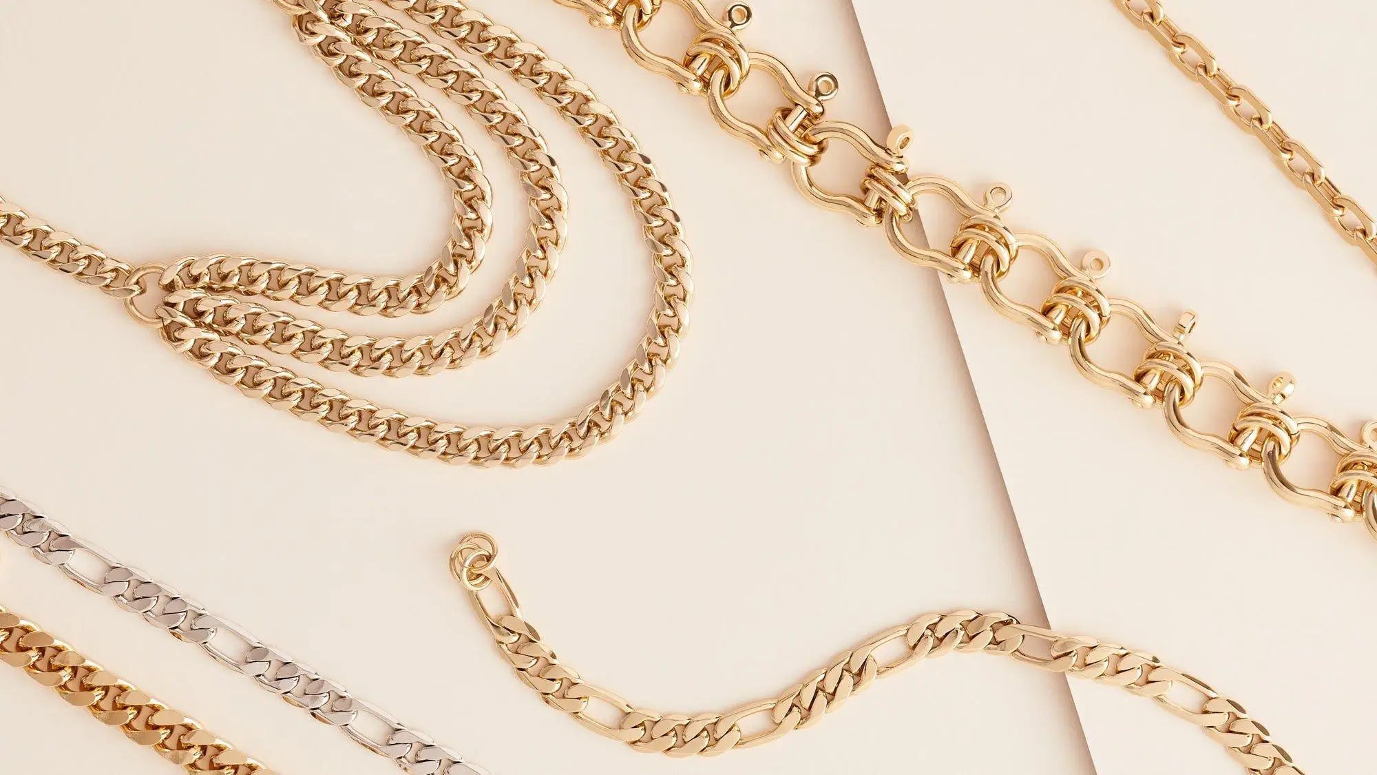 Assorted gold chains showcased in a collection of Elongated Link Eyewear Chains.