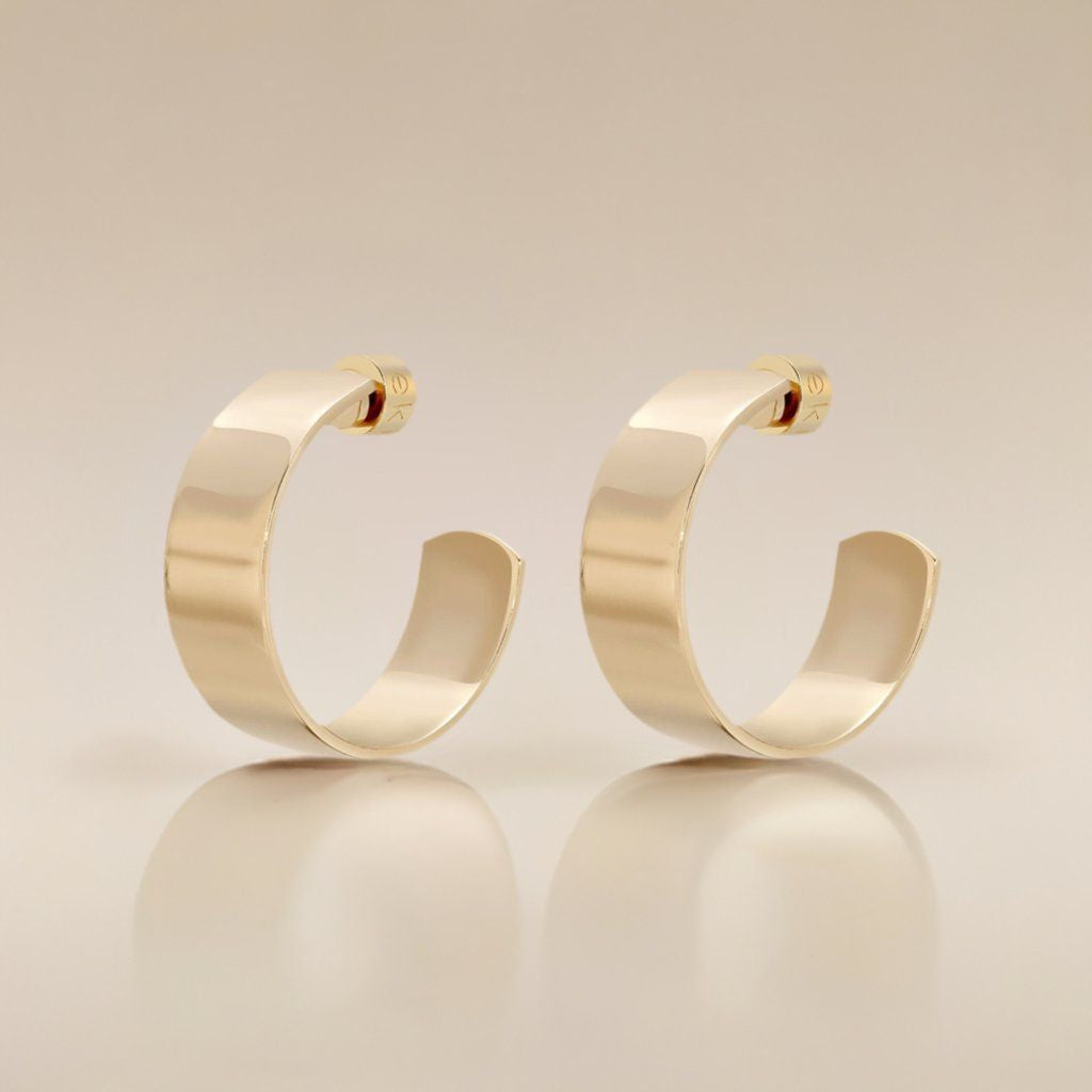 Pair of 14k Gold Rhodium Skylar Hoops featuring wide flat brass design