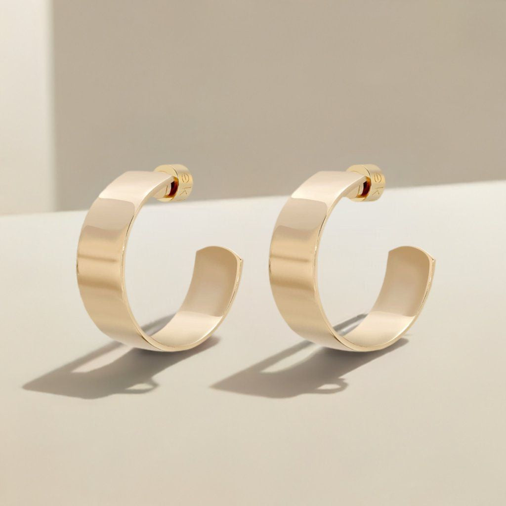 Pair of 1 inch Skylar Hoops in wide flat brass with 14k gold rhodium finish