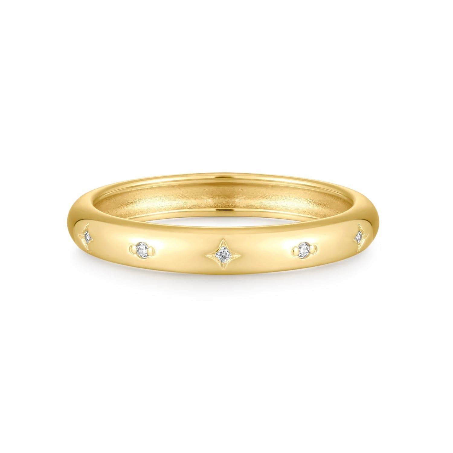 a yellow gold ring with three diamonds