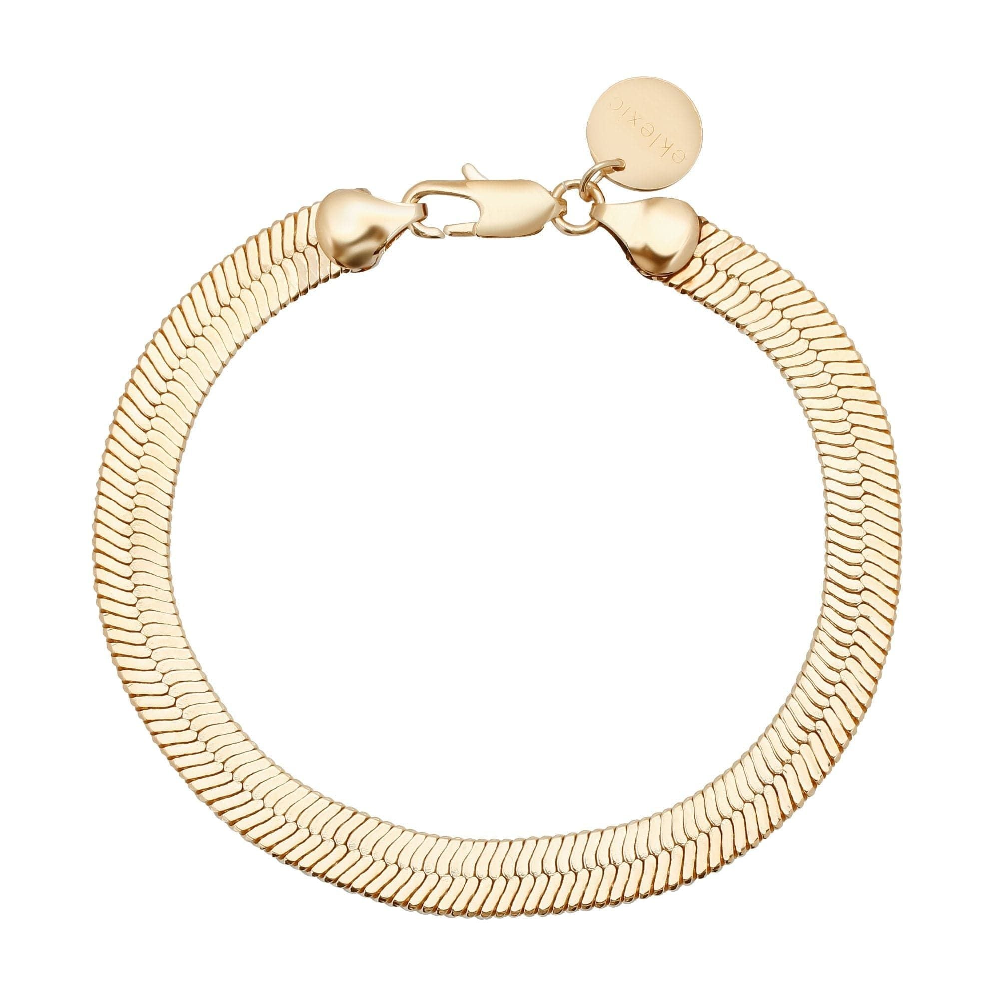 Gold herringbone bracelet featuring lobster clasp and charm, part of the Viper Chain Anklet