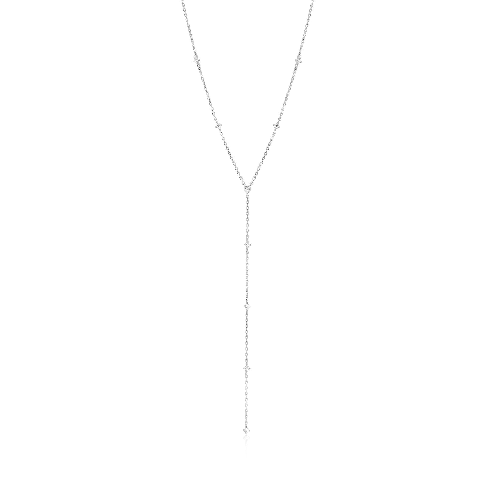 a long silver necklace with a long chain
