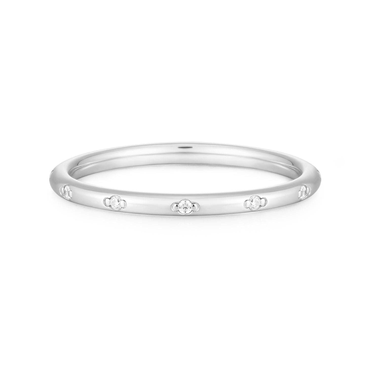 a white gold ring with three diamonds