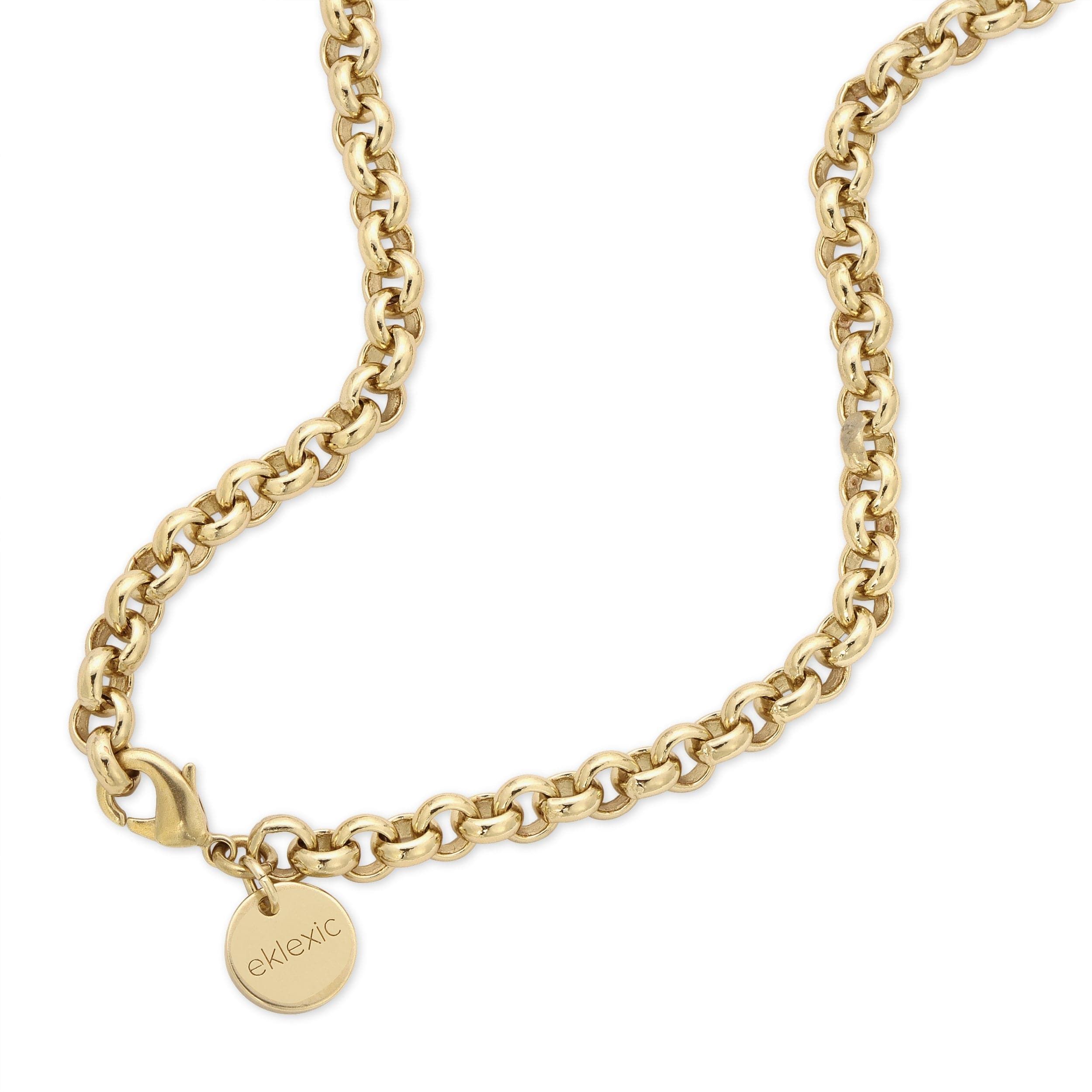 a gold necklace with a heart charm on it