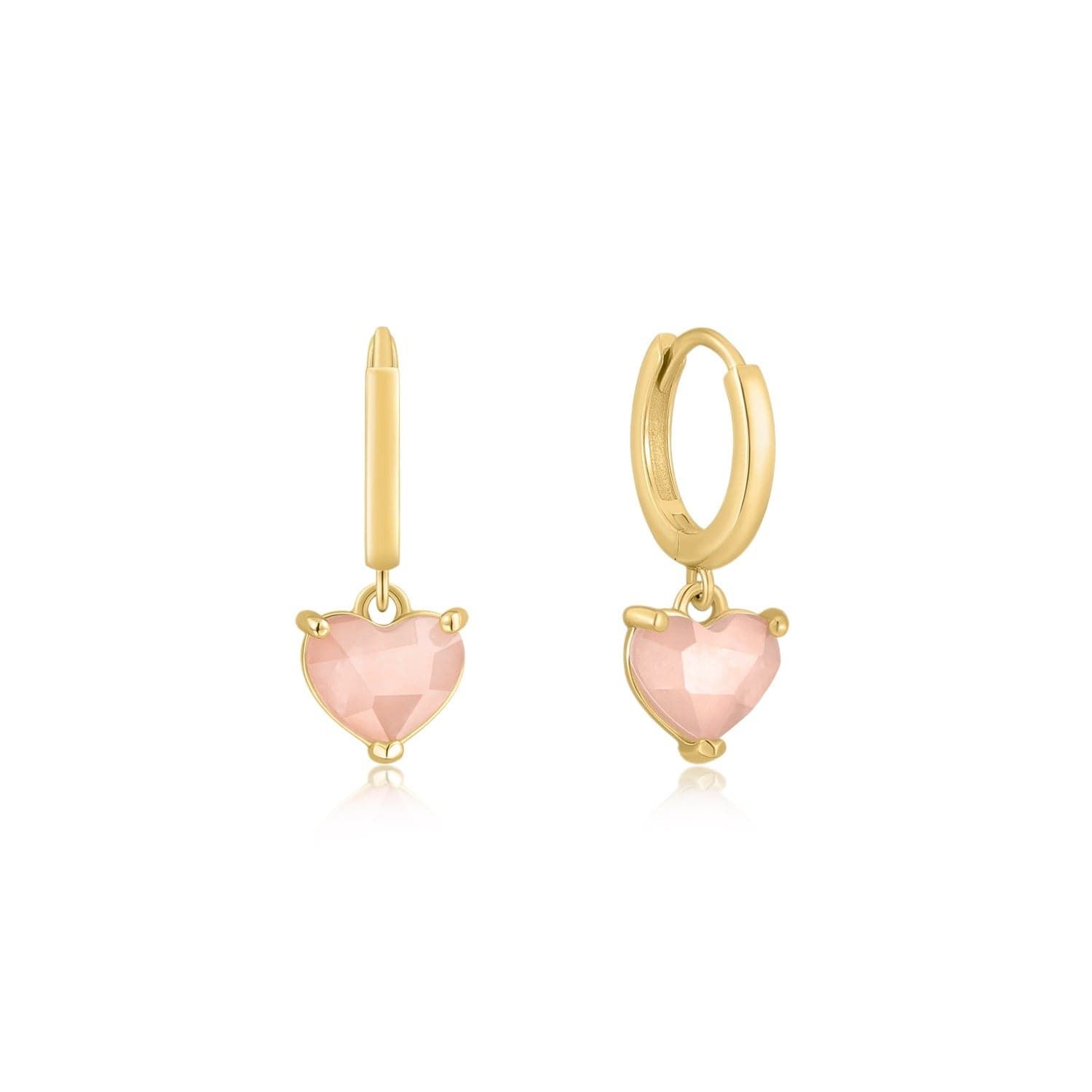 a pair of gold earrings with pink stones