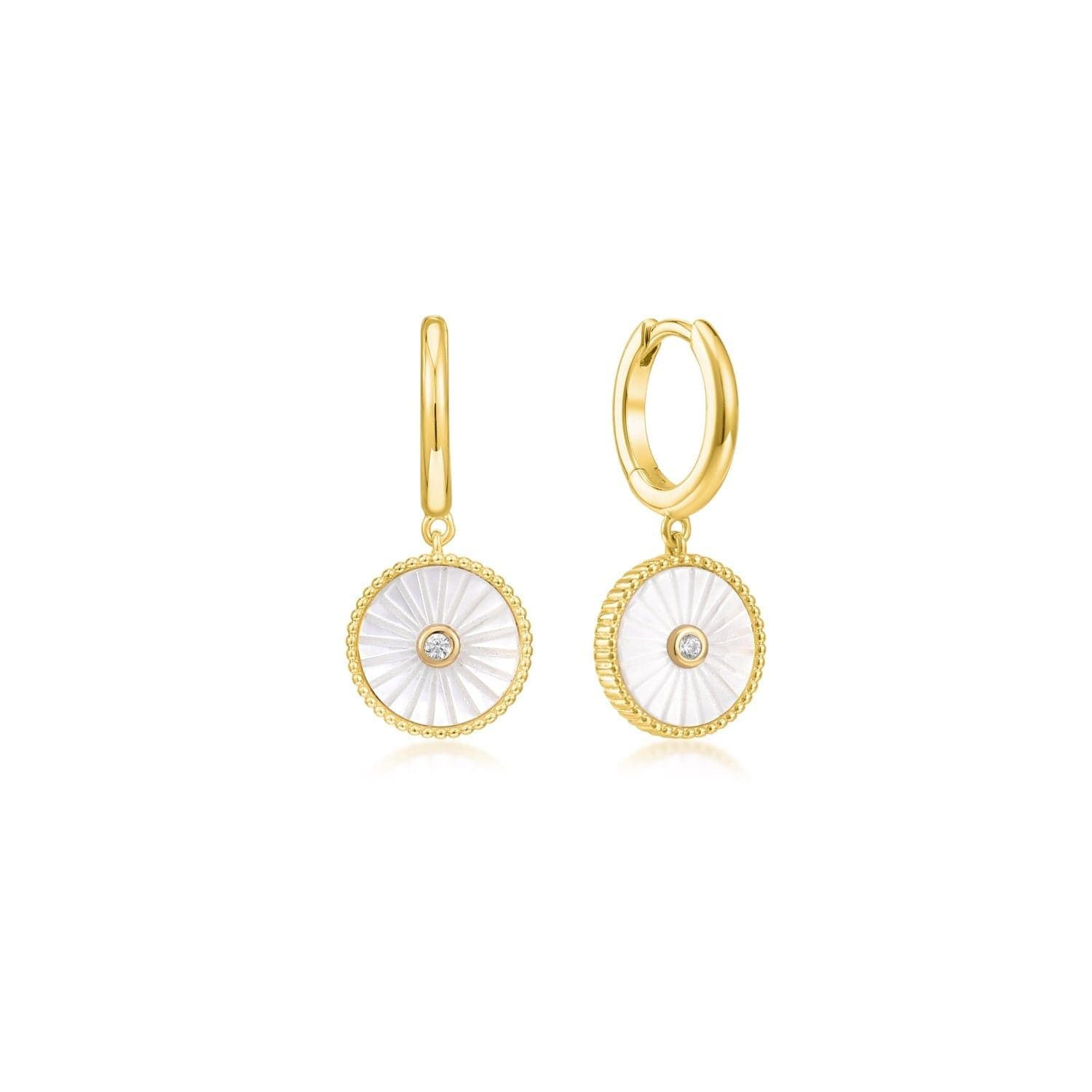 a pair of gold earrings with a white shell