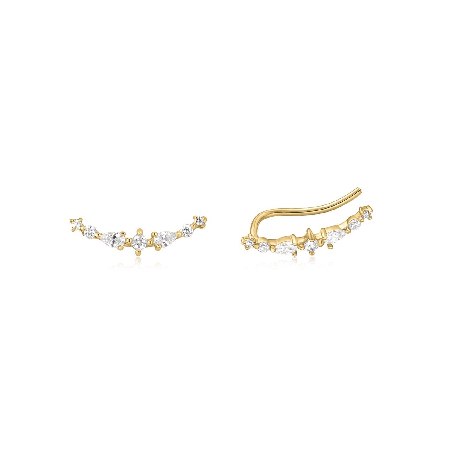 a pair of gold earrings with white stones