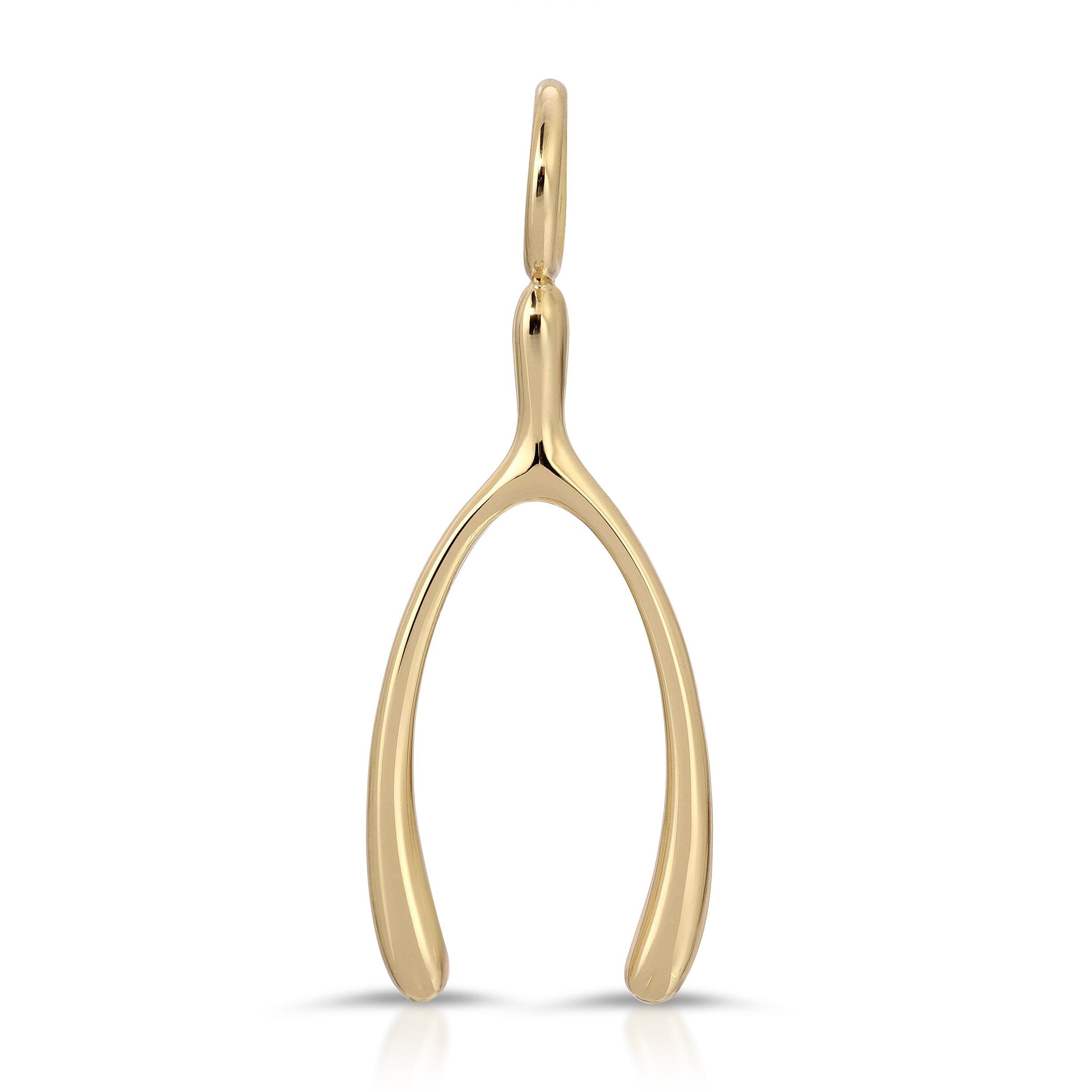 a pair of gold scissors on a white background