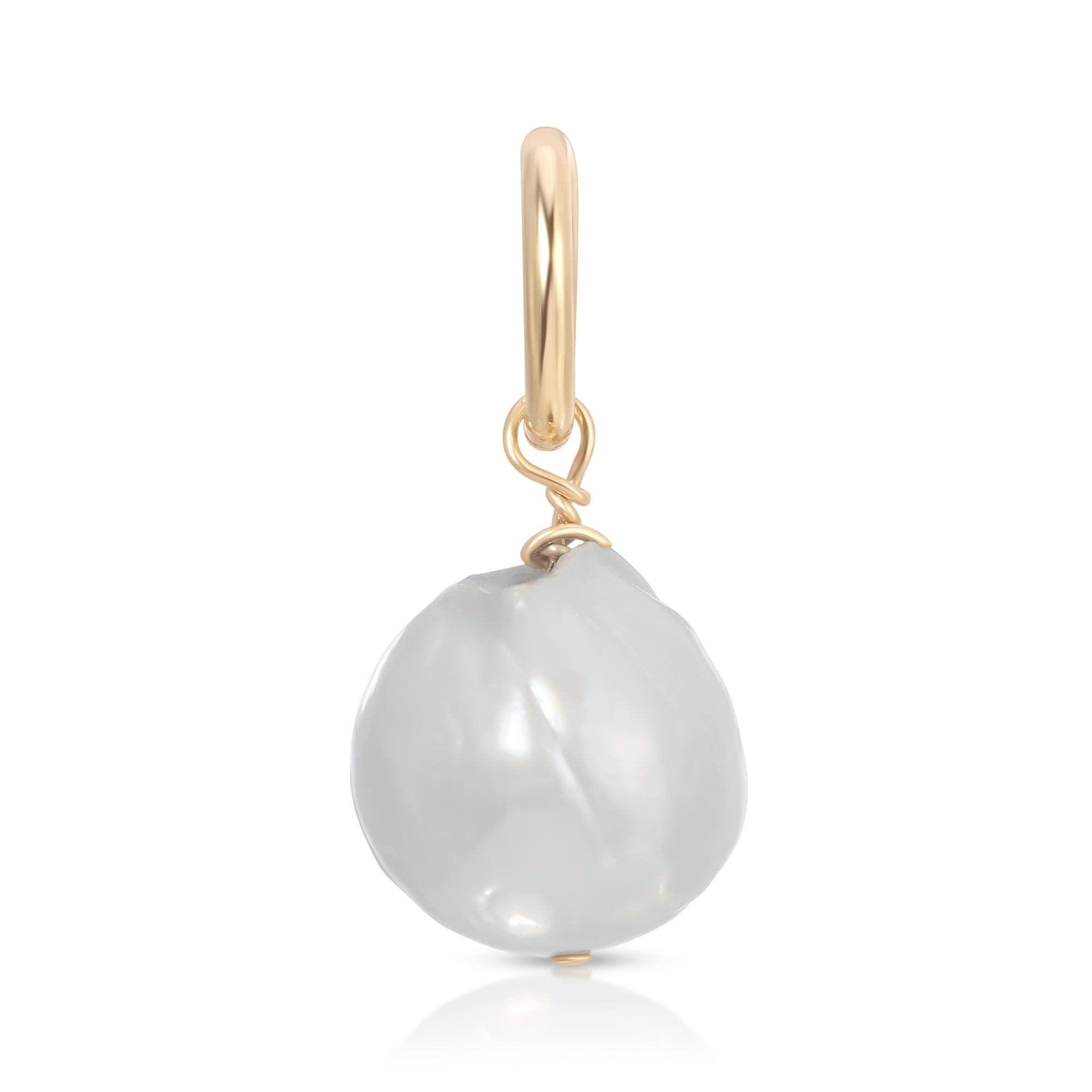 a white pearl pendant on a gold plated chain